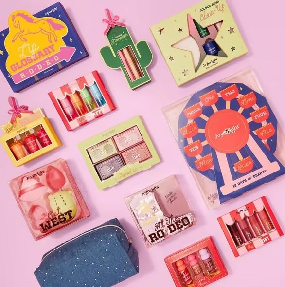 ULTA Colección navideña JoyBright 12 días de Belleza, Set de Regalo de Maquillaje y Cuidado de la Piel, diseño de Noria Rosa y Azul, temática del Oeste.