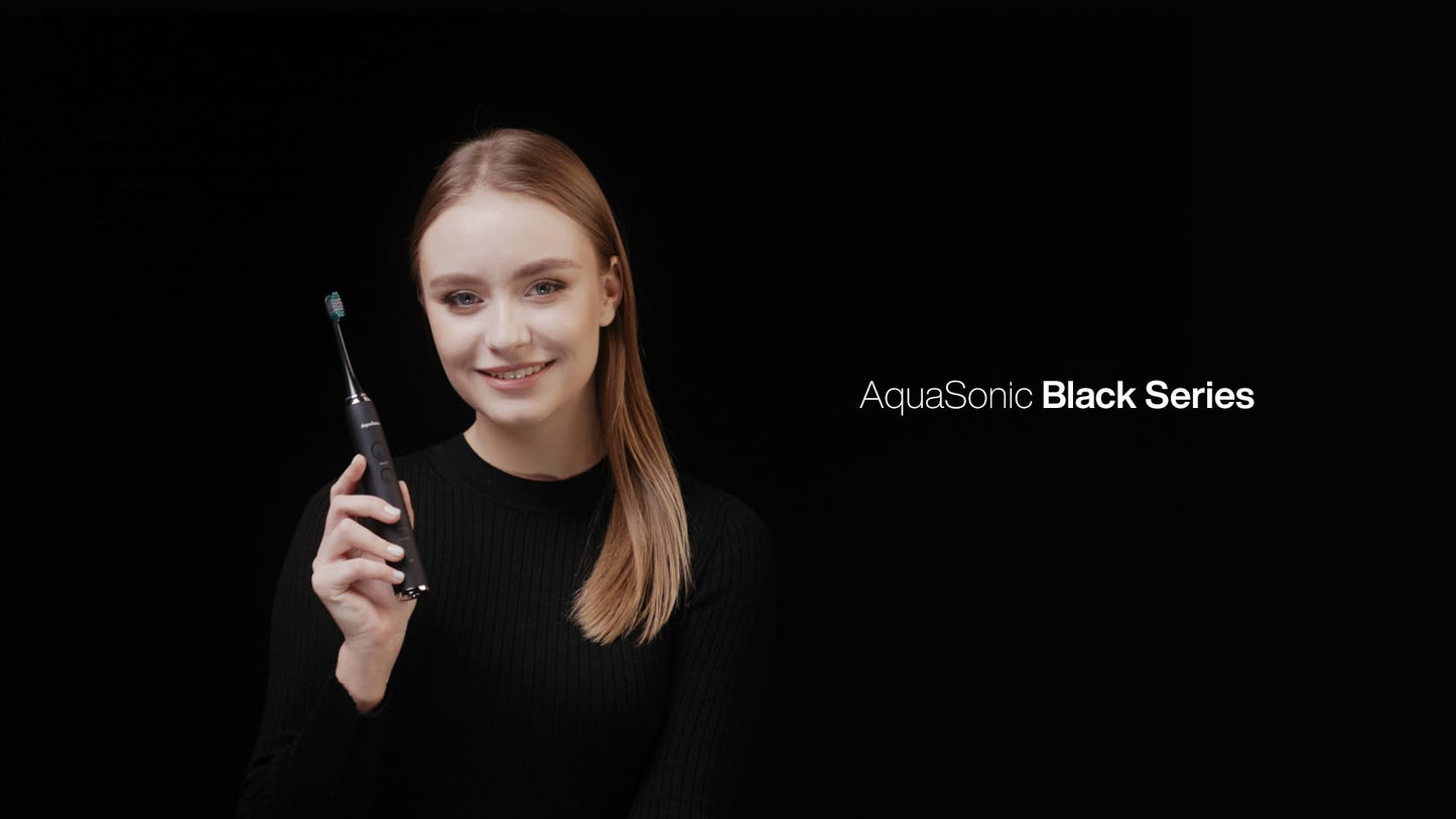 AquaSonic Black Series Cepillo de dientes Ultra Blanqueador - Cepillo de dientes Recargable Aceptado ADA - 8 cabezales de cepillo y estuche de viaje - Motor Ultra Sonic y carga inalámbrica - 4 modos w Temporizador inteligente - Sonic Electric