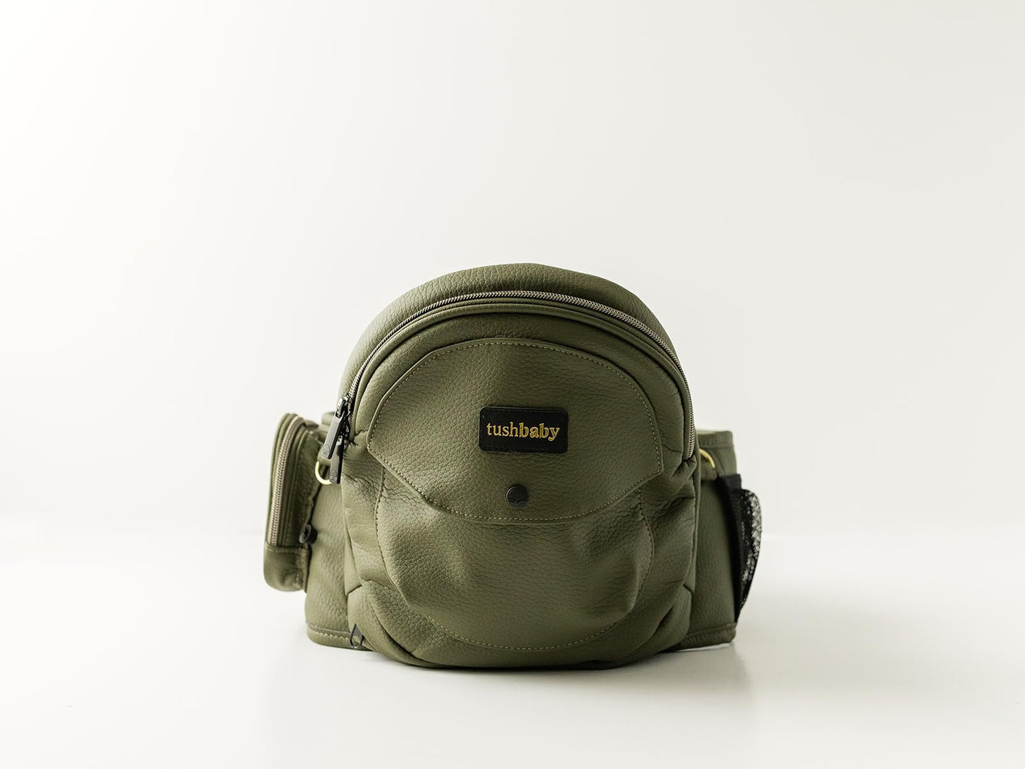 Cangurera Ergonómica Tushbaby Olivo Piel Vegana con Soporte de Cadera para Bebé