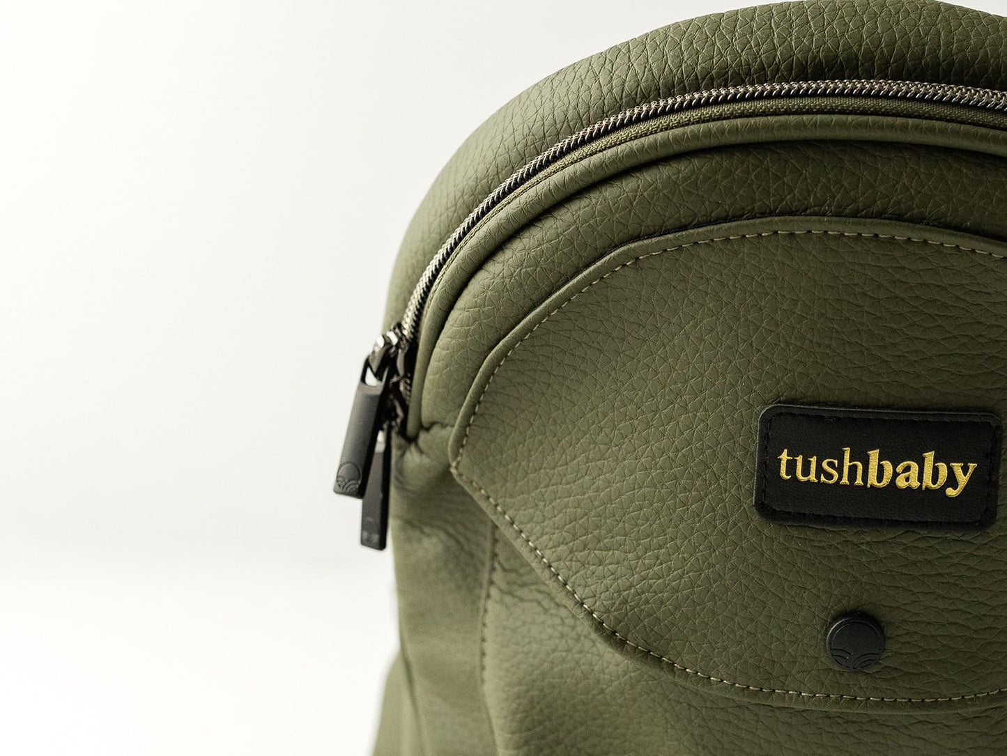 Cangurera Ergonómica Tushbaby Olivo Piel Vegana con Soporte de Cadera para Bebé