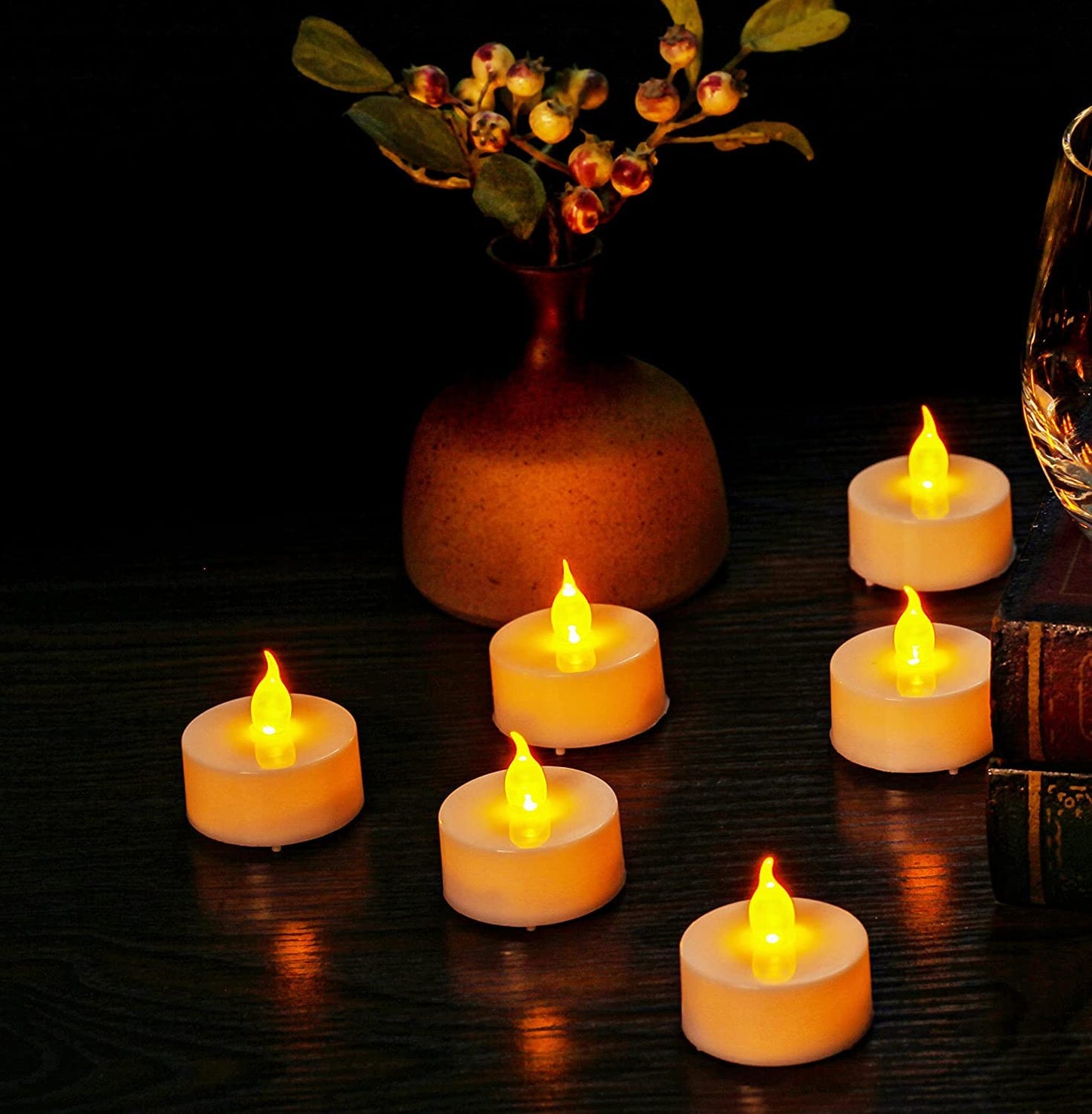 Anziner - Paquete de 100 velas de té LED sin llama realistas y brillantes que duran 200 horas más largas que funcionan con pilas, luces de té eléctricas para bodas, Halloween, Navidad (amarillo