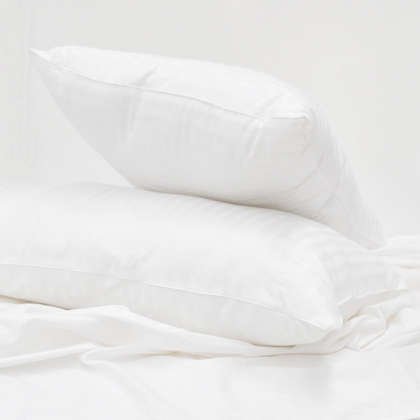 Almohadas Spring Air Essence Durazno Pack 2 soporte cabeza y cuello anti ácaros e hipoalergénico