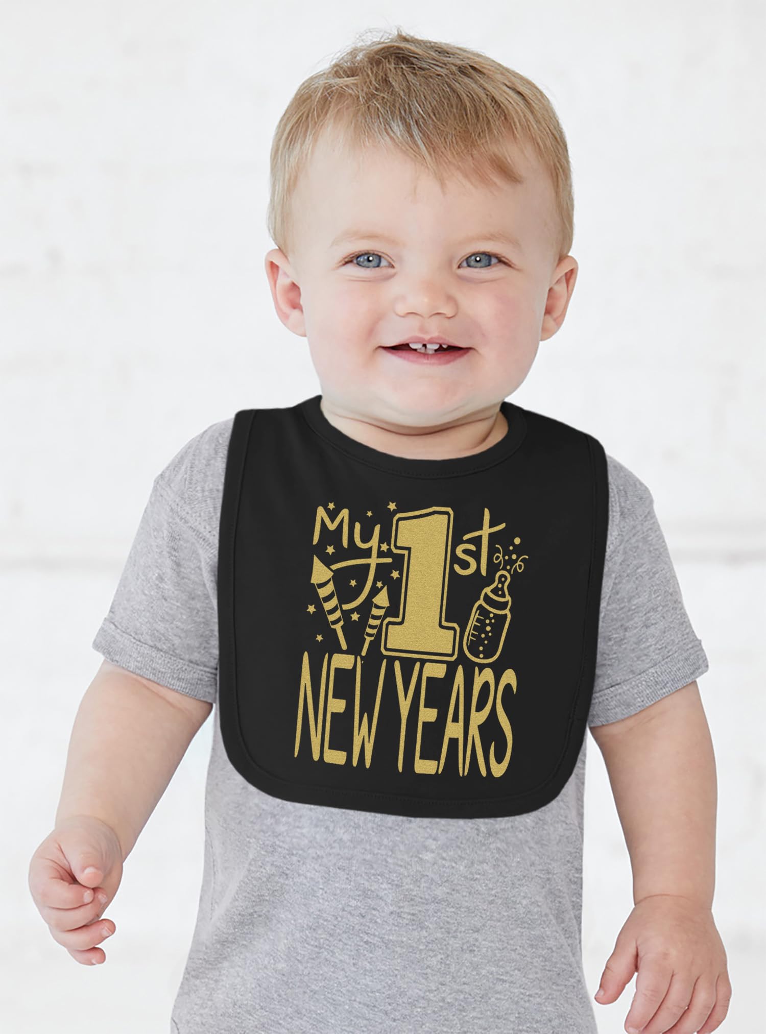 Baberos Aiden's Corner negro con diseño de copos de oro para bebé y niña