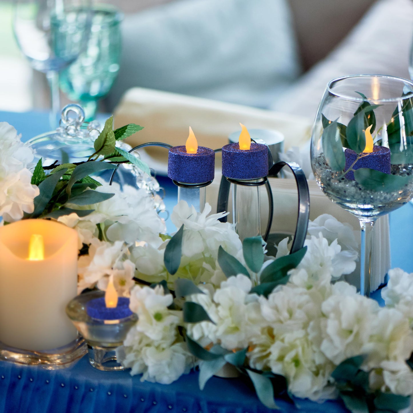 FURORA LIGHTING - Velas LED con purpurina azul real, paquete de 12, velas parpadeantes sin llama para decoración del hogar, 1.5 pulgadas de ancho x 1.65 pulgadas de alto, funciona con pilas