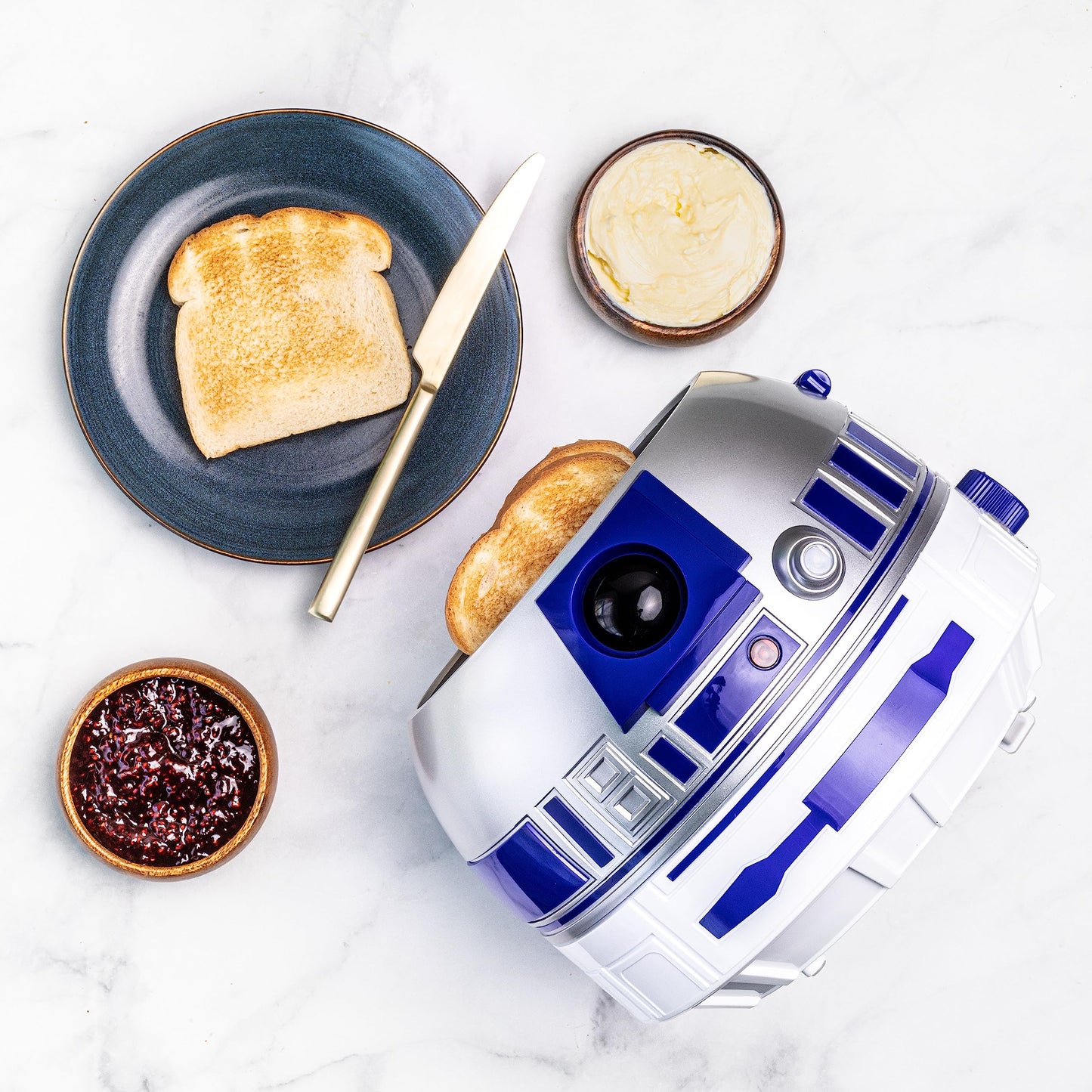 Uncanny Brands Star Wars R2D2 tostador de lujo, se ilumina y hace sonidos como Artoo