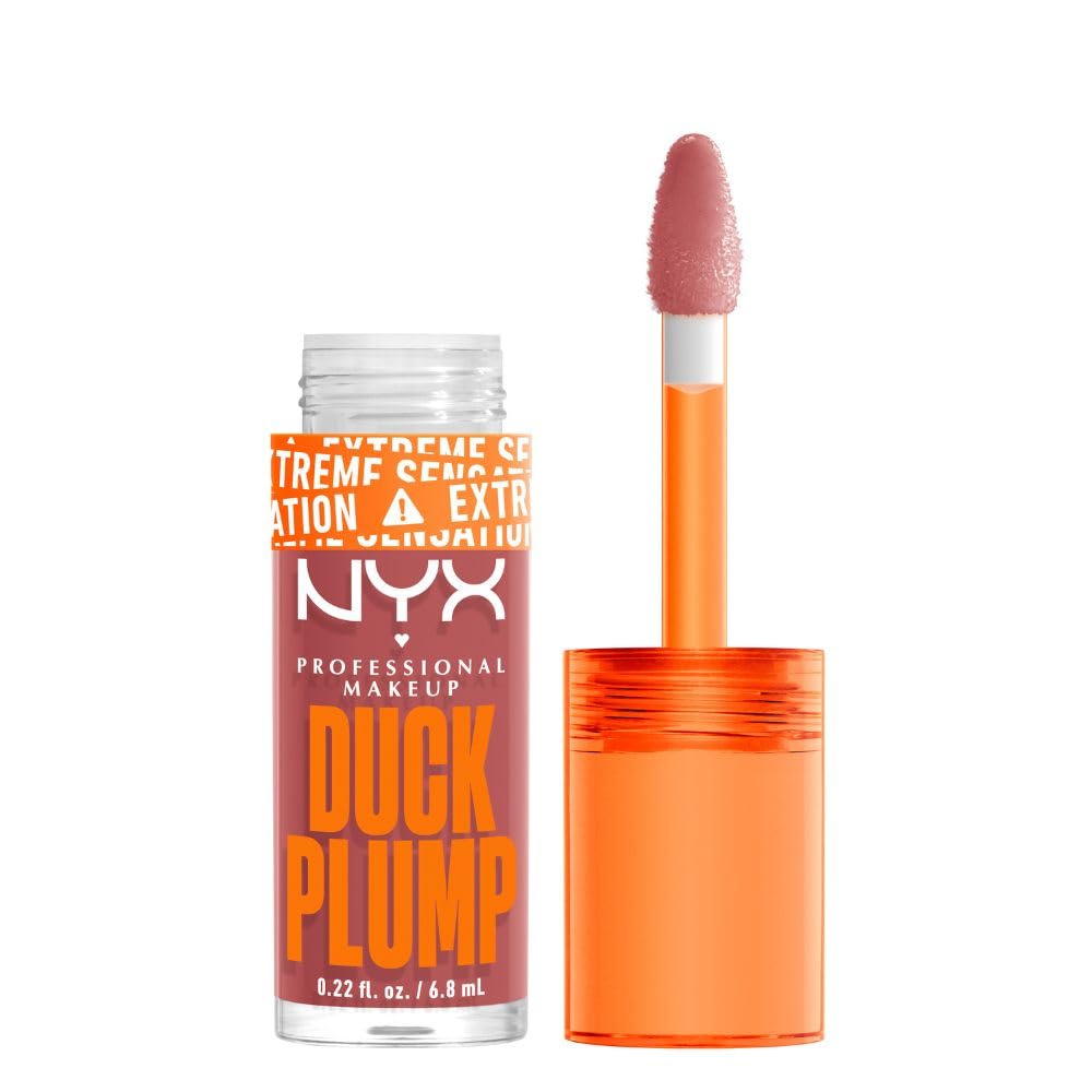 NYX Professional Makeup, Duck Plump, 7ml. Tono: Nude Swings (café). Brillo labial voluminizador con efecto plumping para un volumen instantáneo. Gloss infusionado con jengibre picante para un volumen visible y de larga duración. Fórmula vegana.