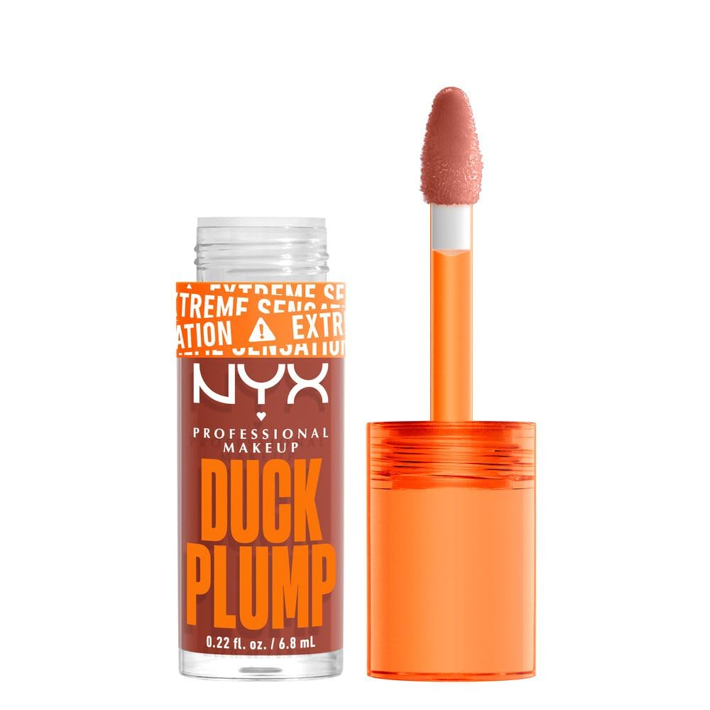 NYX Professional Makeup, Duck Plump, 7ml. Tono: Brown of Applause (rojo). Brillo labial voluminizador con efecto plumping para un volumen instantáneo. Gloss infusionado con jengibre picante para un volumen visible y de larga duración. Fórmula vegana.