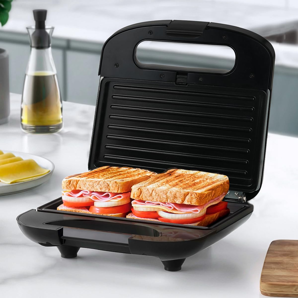 Sandwichera Eléctrica Antiadherente con Moldes de Cerámica Desmontables y Asa Termoaislante