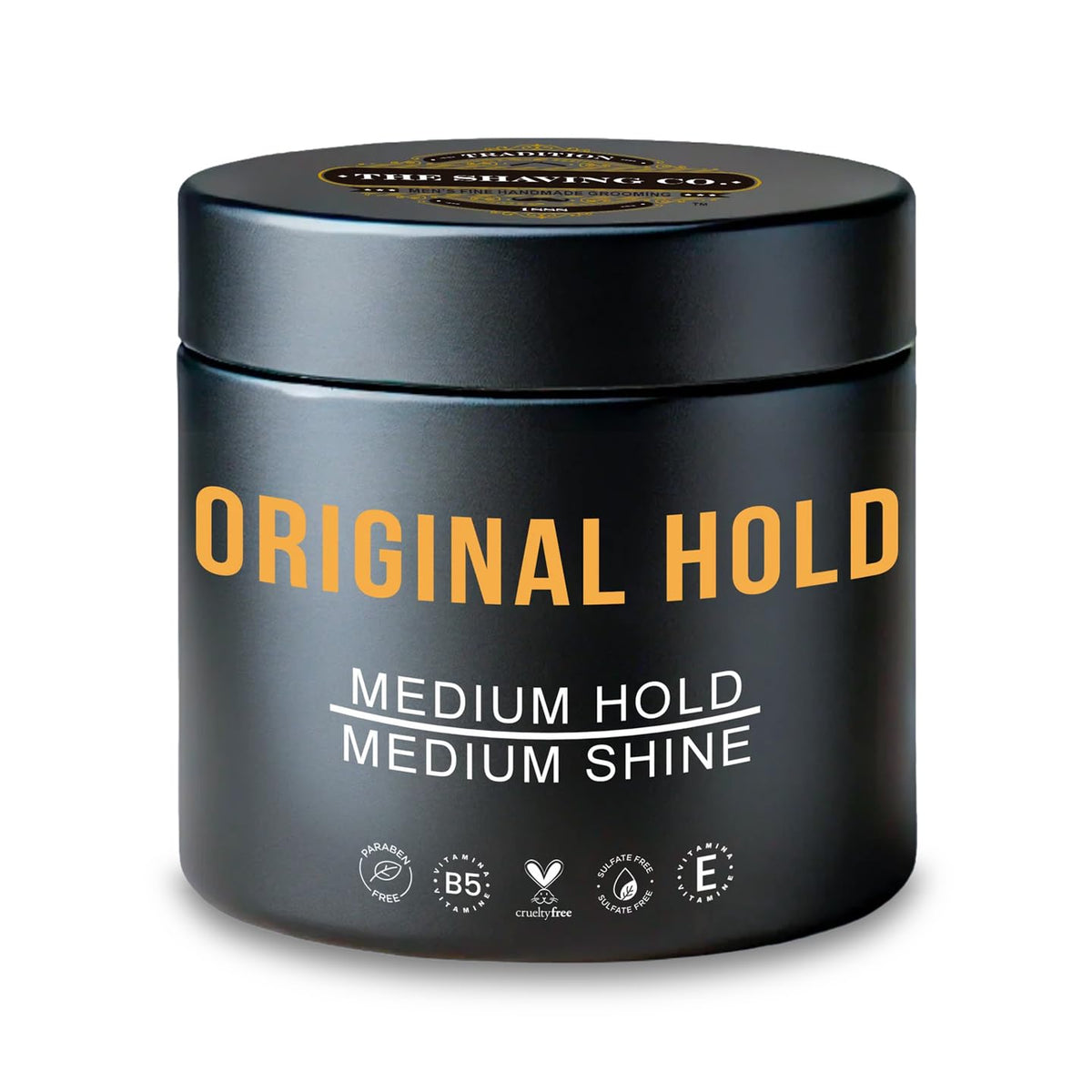 ORIGINAL HOLD POMADE The Shaving Co. Cera para el cabello base agua. Original Hold Pomade. FIJACIÓN MEDIA - BRILLO MEDIO. Libre de Parabenos - Libre de Sulfatos - Cruelty Free - Contiene VITAMINA B5 y E. Medium Hold Medium Shine. Pomada para cabello. Hair