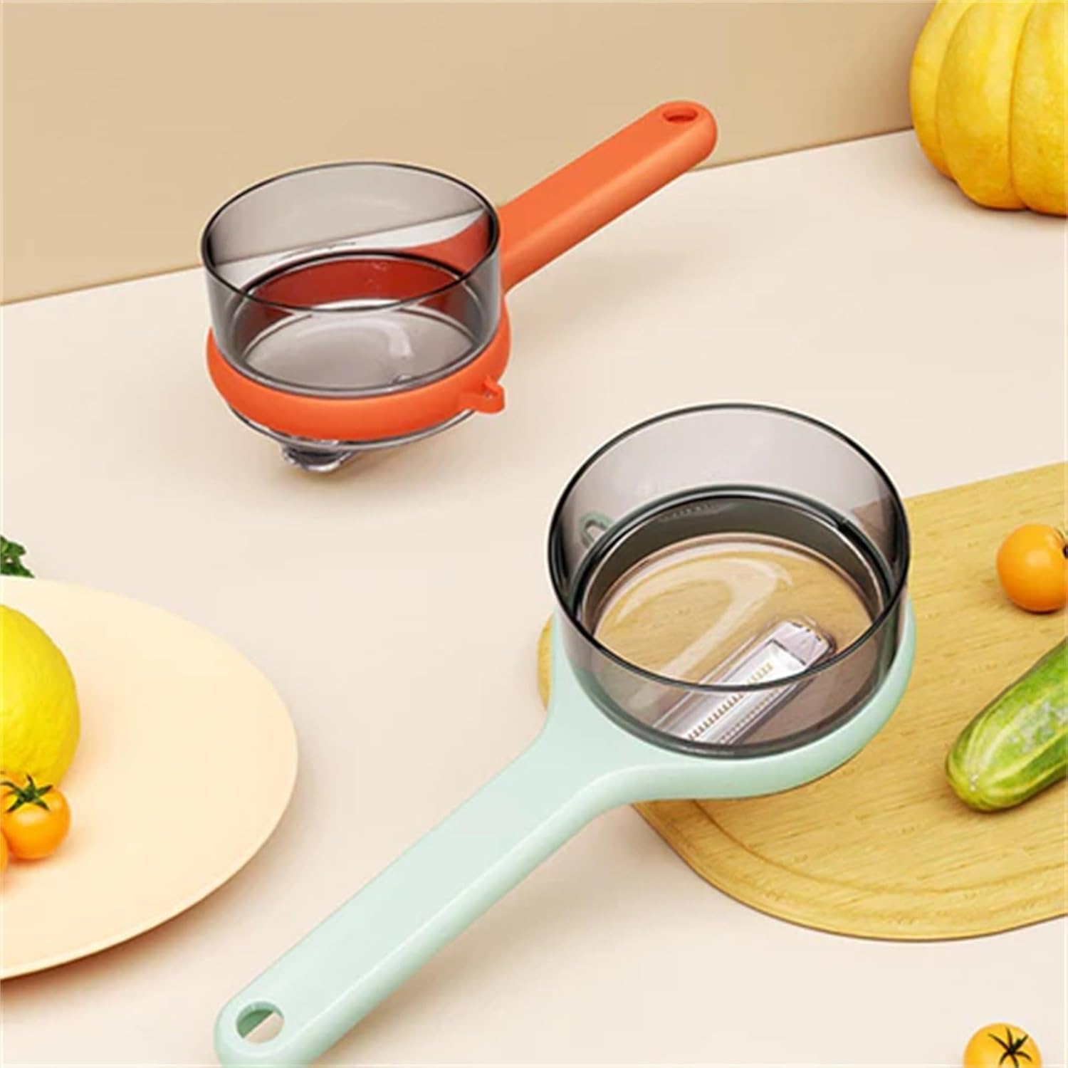 Liahelianx Pelador de Frutas y Verduras Reversible con Caja - Acero Inoxidable, Multifuncional, Trampa de Residuos, Utensilio de Cocina para Pelar con Hoja Giratoria (Naranja)