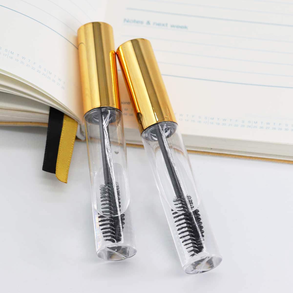 GTHER - Juego de 10 botellas vacías para máscara de pestañas (10 ml, incluye varita de pestañas, insertos y embudos de goma, para aceite de ricino/crecimiento de pestañas, envase de crema de pestañas con tapa, color dorado