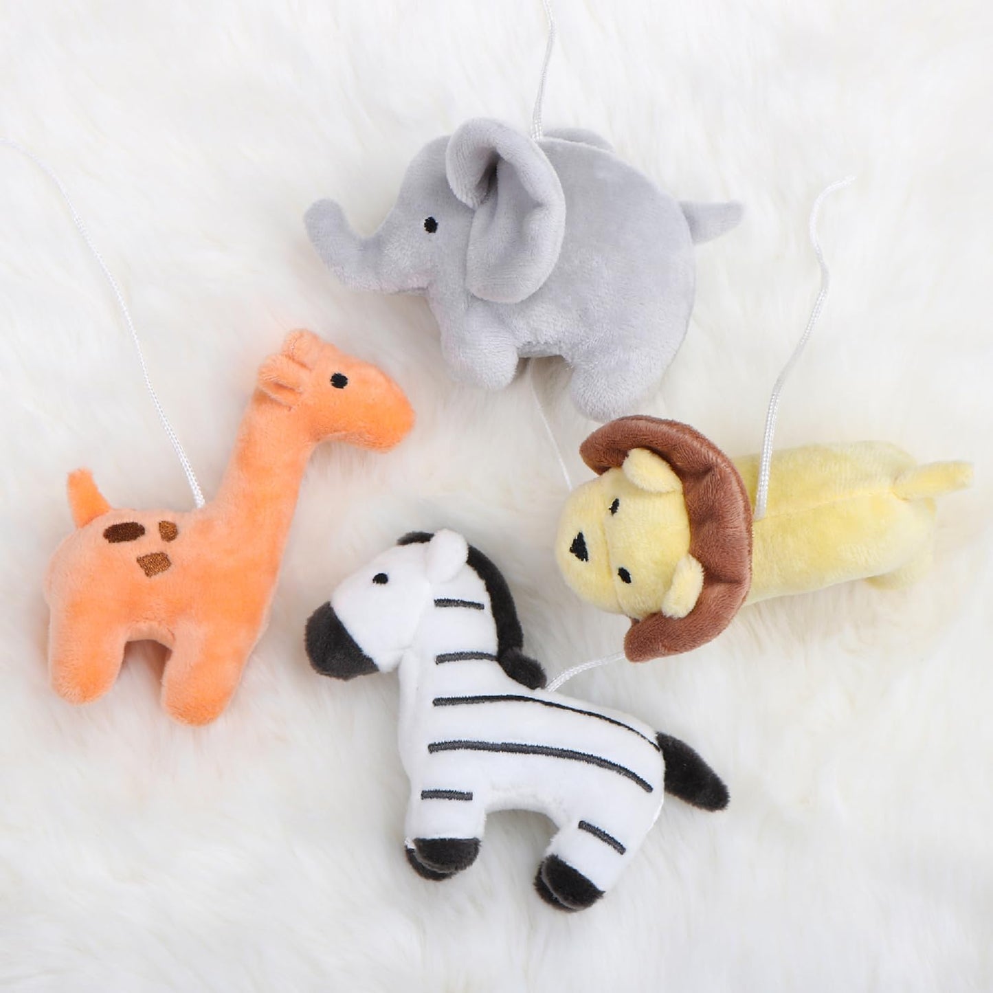Móvil Musical para Cuna The Peanutshell blanco con Animales de Selva y Canciones de Cuna para Bebés