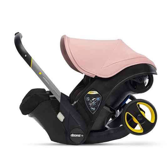 Auto-Asiento Infantil Doona Rosa Blush con Base y Conversión Rápida a Carriola