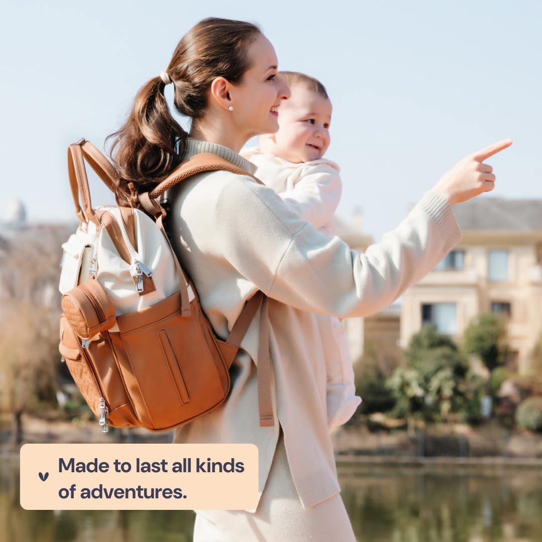 BabbleRoo - Mochila para pañales de cuero, mochila grande multifunción con cambiador y correas para el carrito y estuche para chupete, mochila de viaje elegante unisex, bolsa cambiadora de pañales