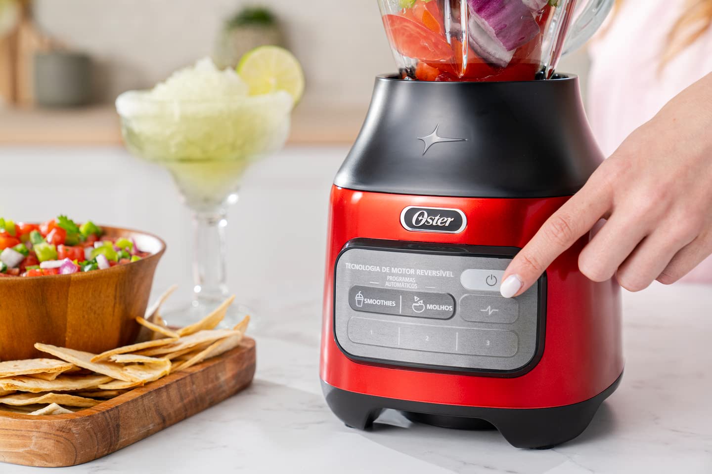 Licuadora Oster Roja Tecnología Reversible 2 Programas Automáticos y 3 Velocidades más Pulso