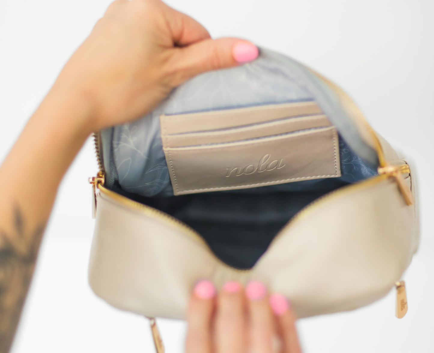 Nola - Bolsa de pañales - Mochila o bandolera para bebé con almacenamiento organizado (expreso)