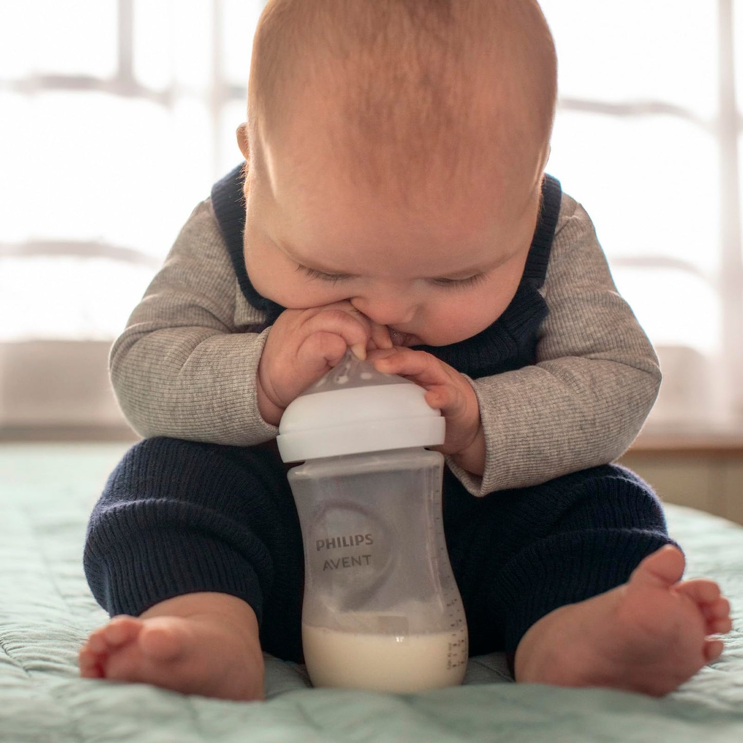 Biberón Philips Avent Natural Response Transparente con Válvula Anticólicos Flujo Medio para Bebés, Paquete de 3