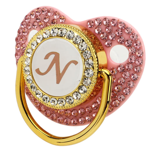 Chupete de Silicona Sorandy Dorado Curvo con Clip de Letras y Diamantes de Imitación para Bebé