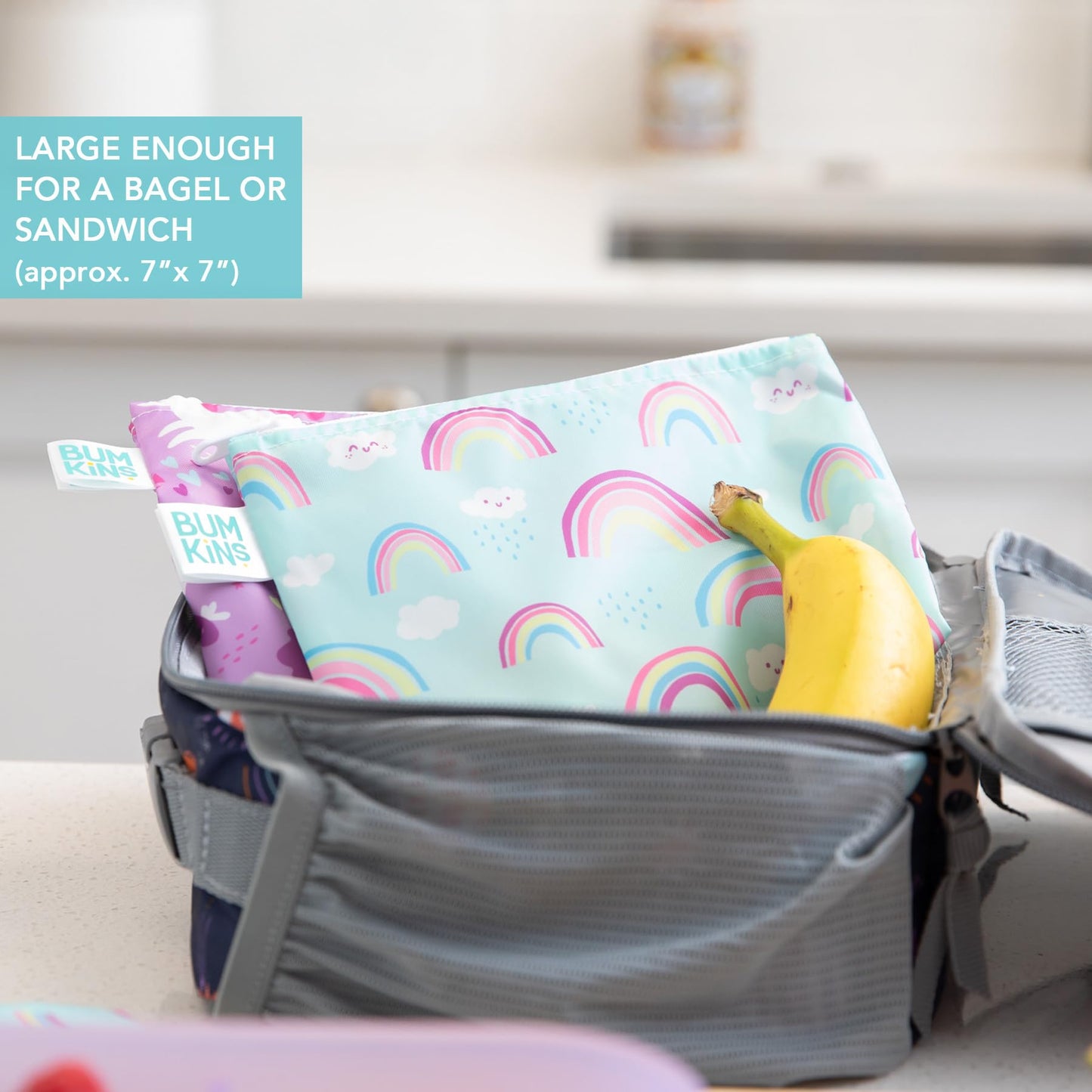 Bumkins - Delantal con volantes y 2 bolsas para sándwich, tela impermeable, unicornios y arco iris