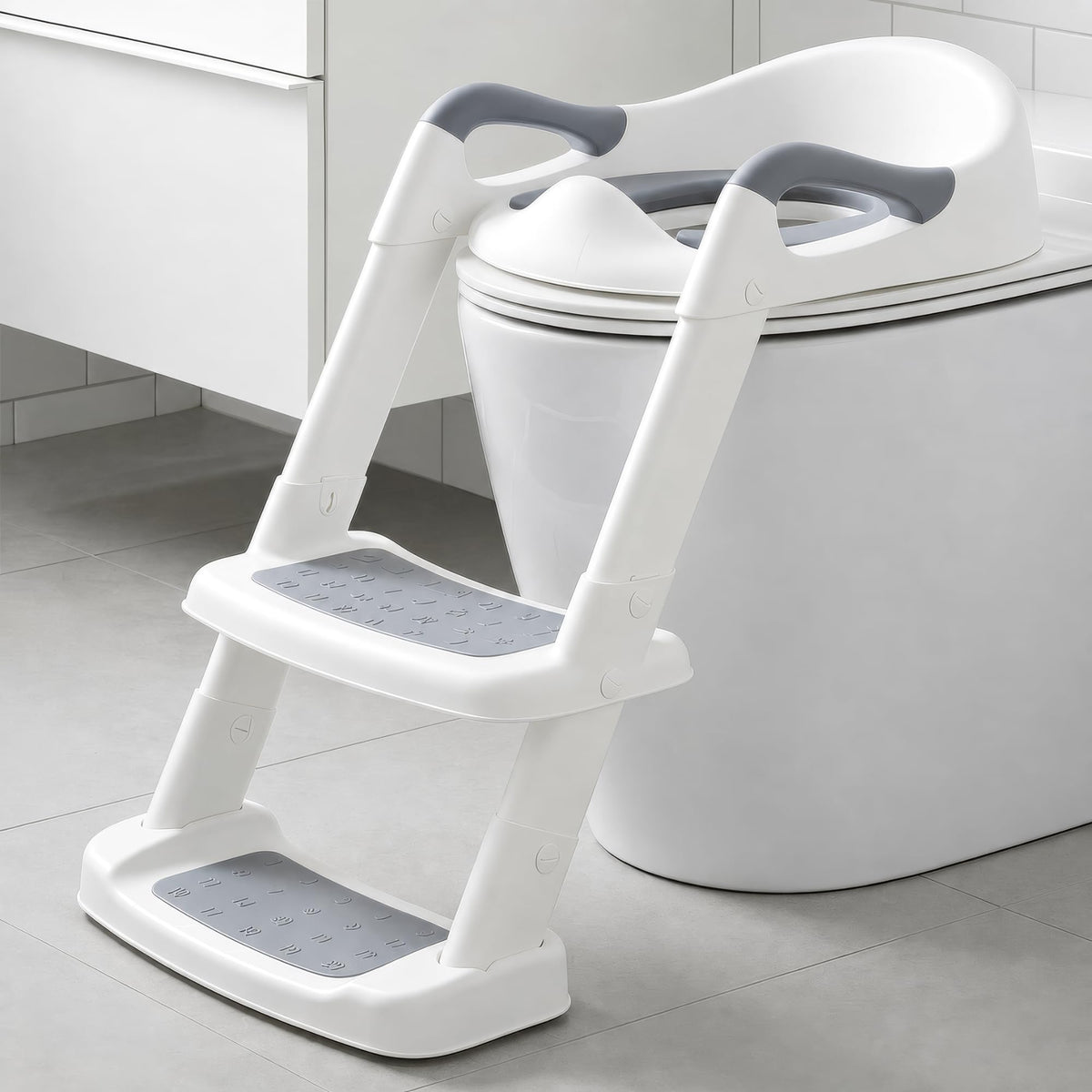 Timotech Asiento de Entrenamiento para Baño con Escalera Plegable y Cojín Suave, Adaptador de Inodoro Infantil con Agarraderas de Seguridad y Escalón Antideslizante para Niños y Niñas, Gris/Blanco