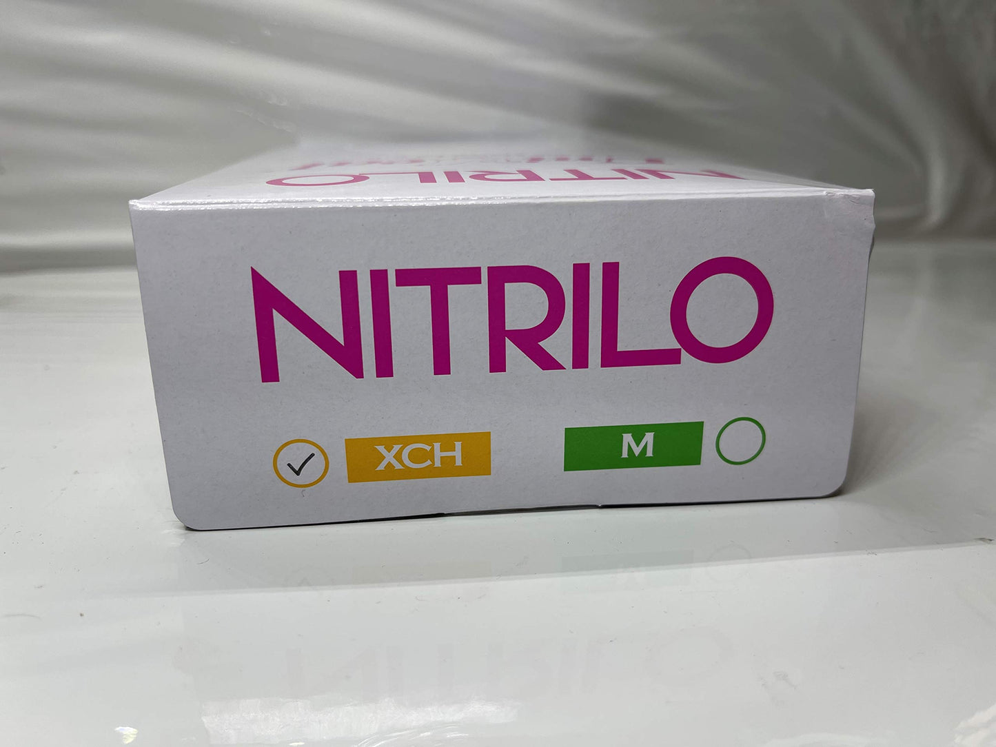 Guante de Nitrilo Uniseal Color Rosa Talla Extra chica