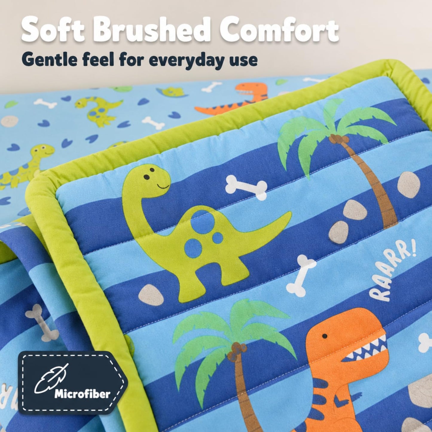 EVERYDAY KIDS Juego de cama para cuna de 4 piezas, dinosaurio, incluye edredón, sábana bajera, volantes y apilador de pañales, juego de ropa de cama para cuna de bebé
