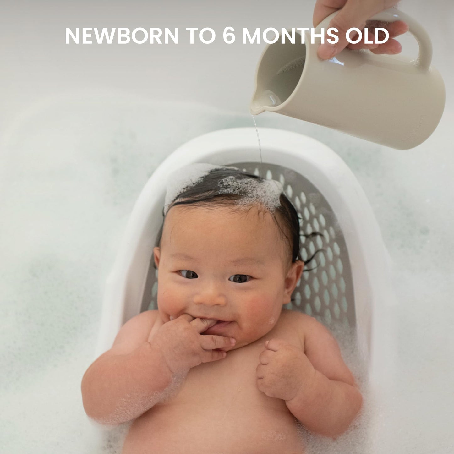 Lulyboo - Soporte plegable para tina de bebé para bebés menores de 6 meses, ergonómico, antideslizante, portátil, con cojín suave y drenaje integrado, ayuda de baño para bebé segura y ahorra espacio