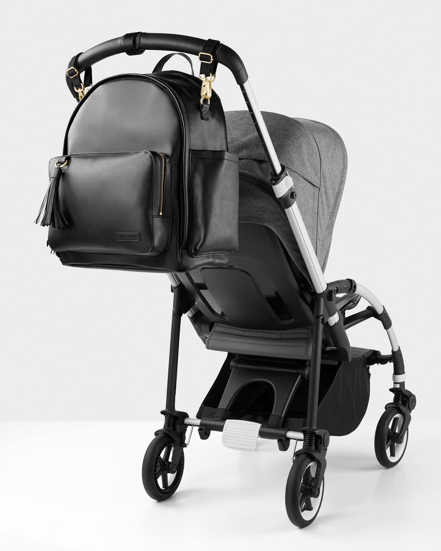 Skip Hop Mochila De Pañales: Bolso De Viaje Para Bebé Multifunción Convertible Greenwich Con Cambiador Y Correas Para Cochecito, Cuero Vegano, Negro