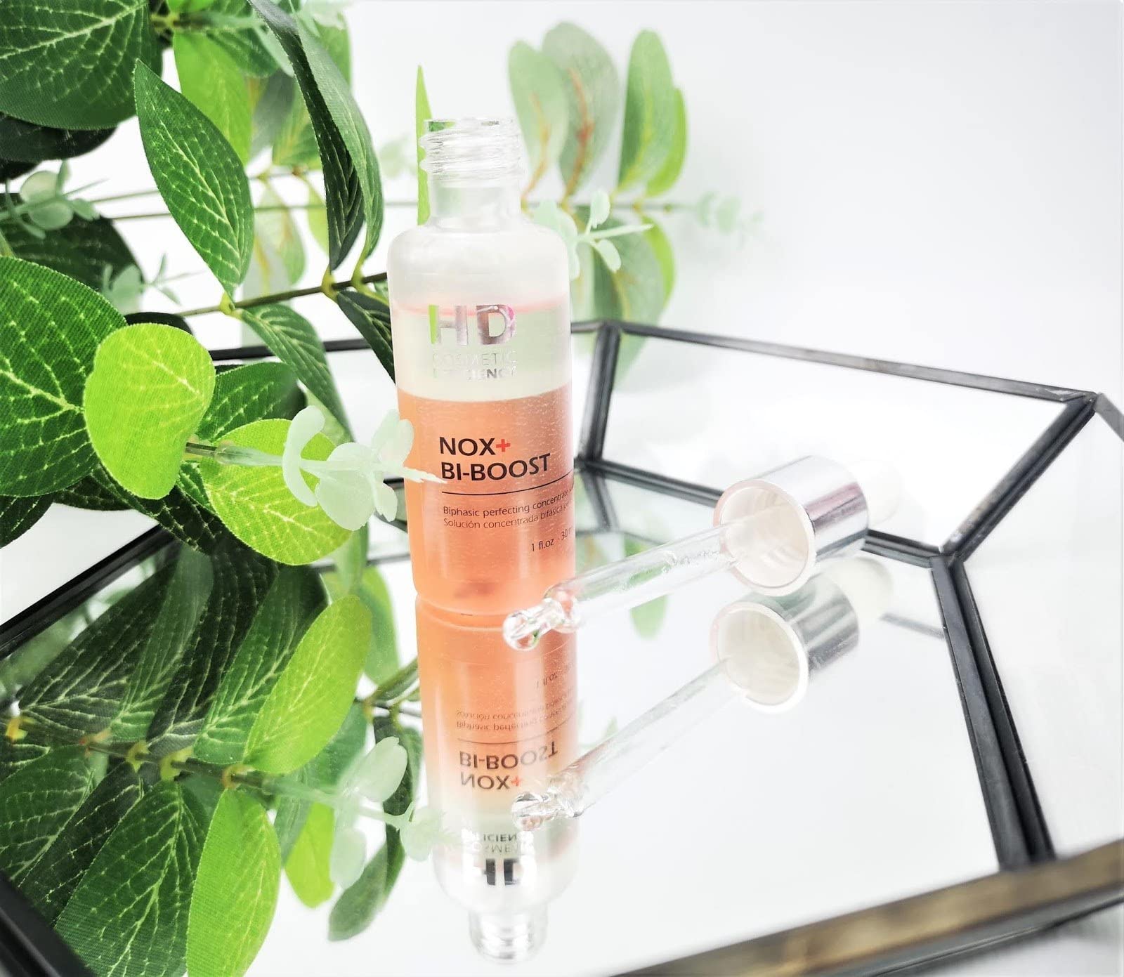 HD Cosmetic Efficiency NOX+ BI-BOOST 30 mL, concentrado bifásica perfeccionador enriquecido con antioxidantes de alta potencia.