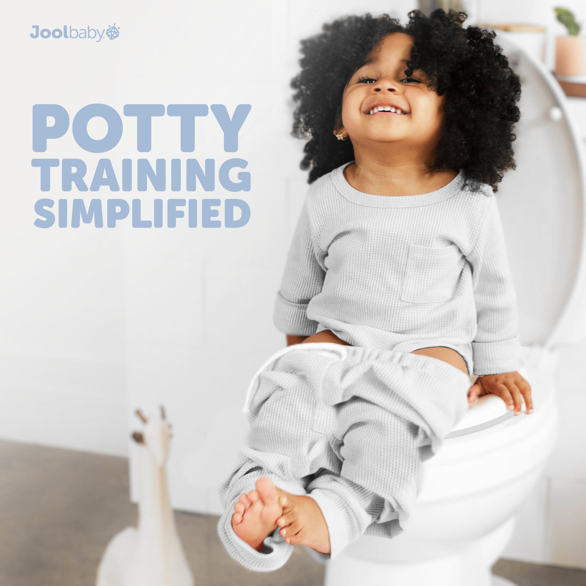 Jool - Asiento de entrenamiento para bebé para niños y niñas, se adapta a inodoros redondos y ovalados, antideslizante con protector contra salpicaduras, incluye gancho de almacenamiento gratuito
