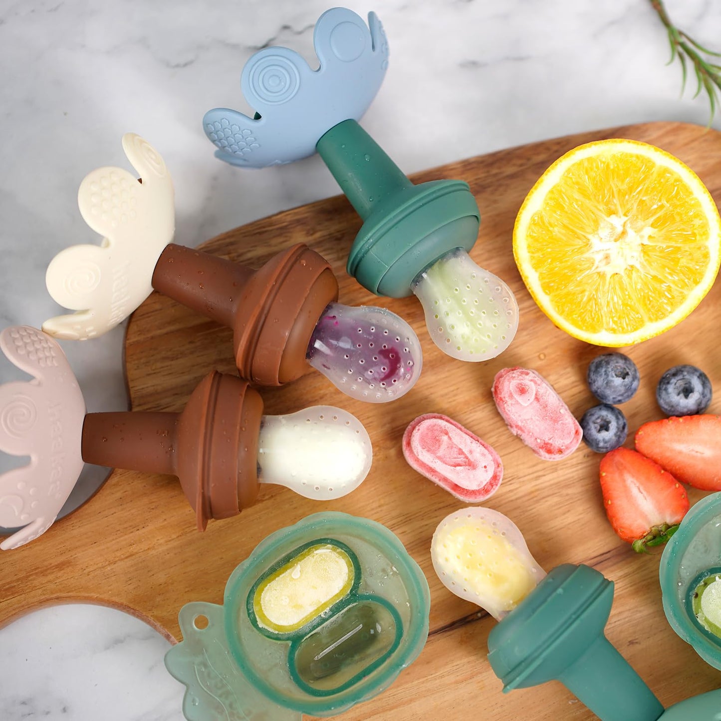 Haakaa - Alimentador de alimentos de frutas frescas para bebé con mini bandeja para congelador, molde de paletas de leche materna para alivio de enfriamiento del bebé, alimentador de malla de silicona