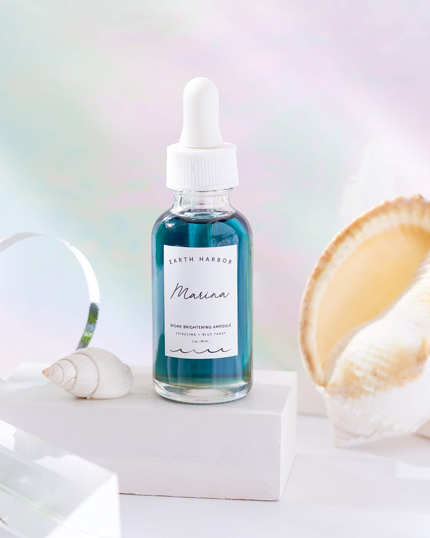 Ampolla Iluminadora Earth Harbor Azul Bronceado con Espirulina y Escualano