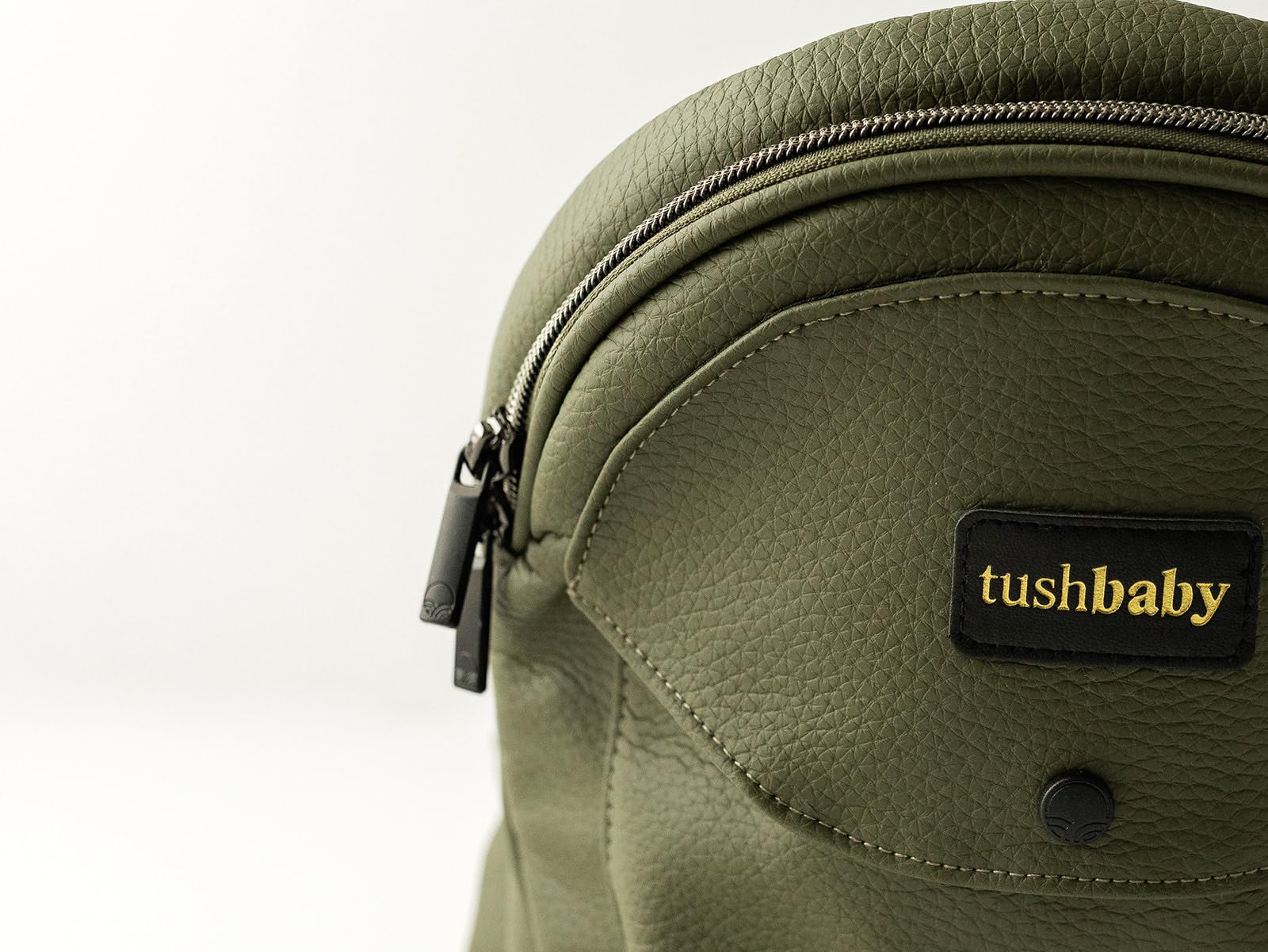 Cangurera Ergonómica Tushbaby Olivo Piel Vegana con Soporte de Cadera para Bebé