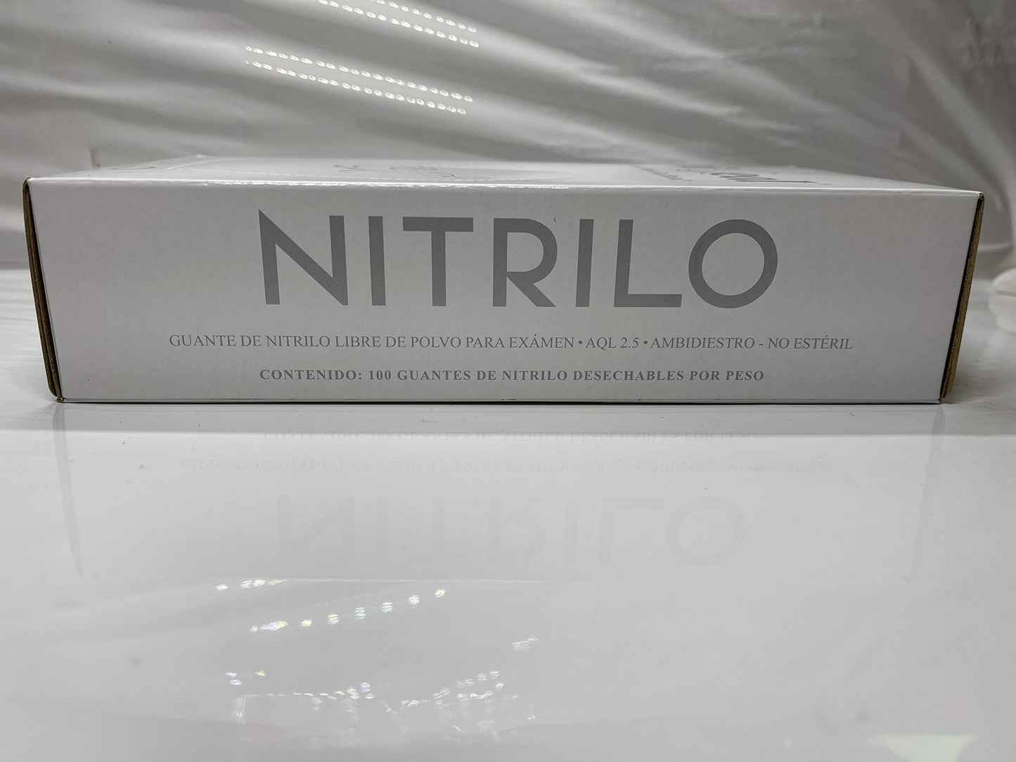 Guante de Nitrilo Uniseal Color Blanco Talla Mediana 100 piezas