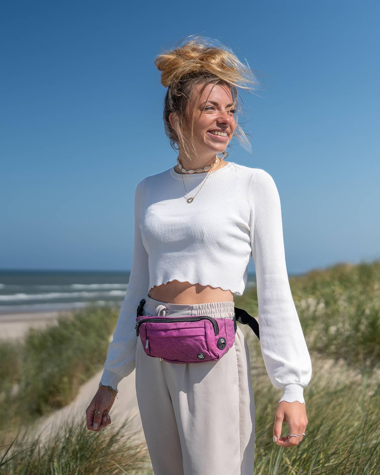 Riñonera Deportiva WATERFLY Negra con Cinturón Extendido para Mujer y Hombre