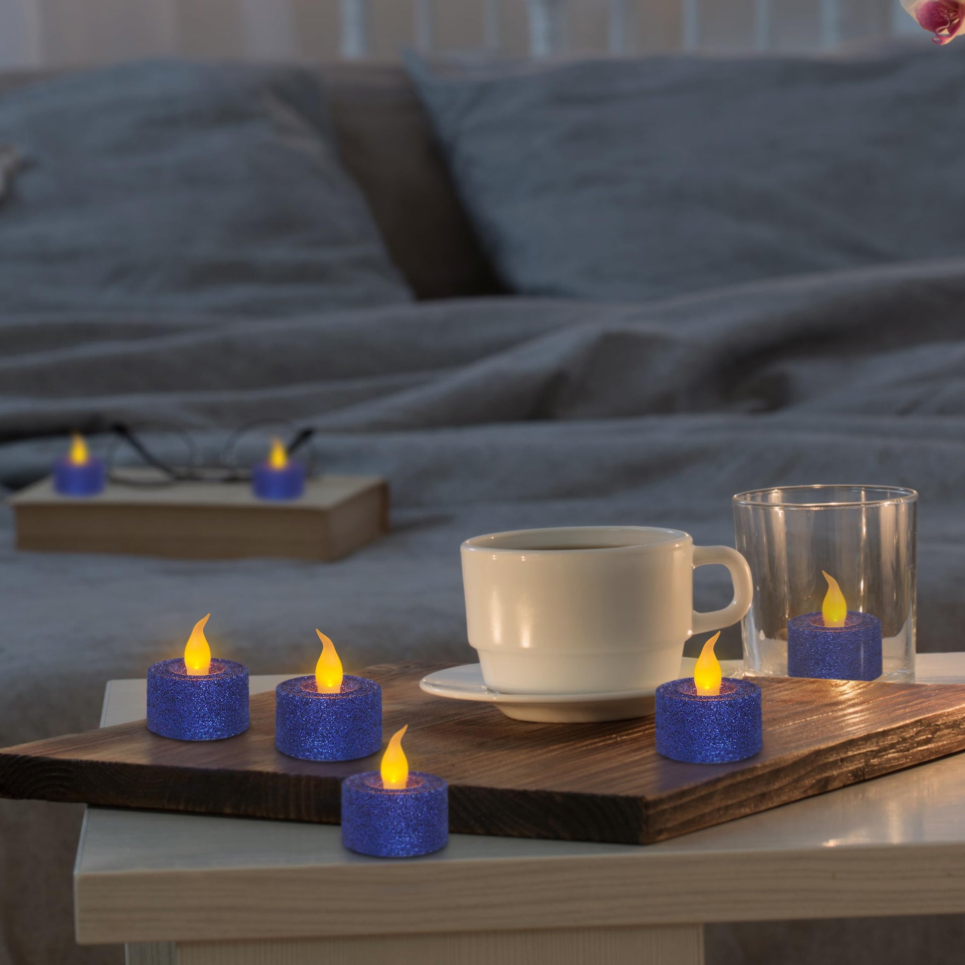 FURORA LIGHTING - Velas LED con purpurina azul real, paquete de 12, velas parpadeantes sin llama para decoración del hogar, 1.5 pulgadas de ancho x 1.65 pulgadas de alto, funciona con pilas