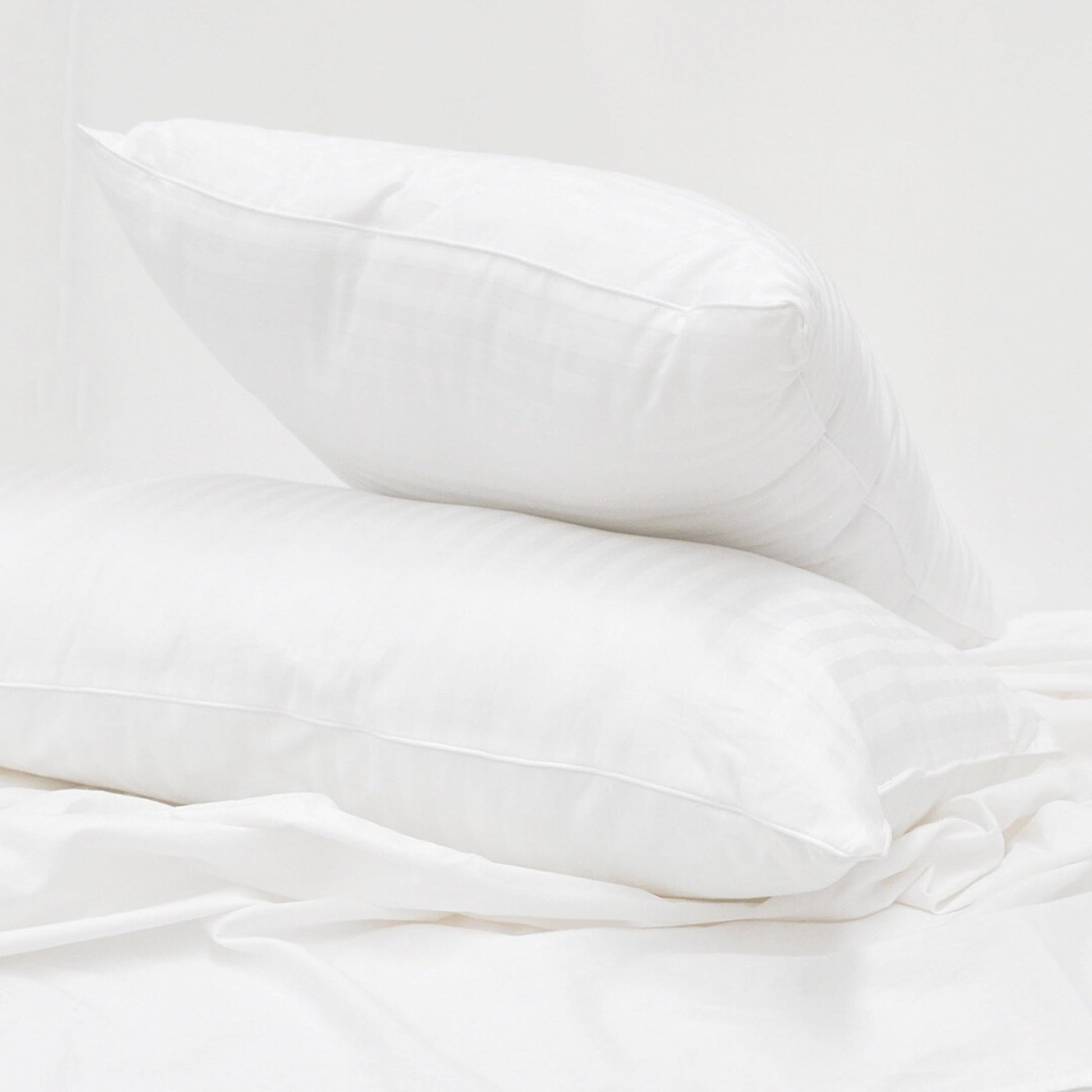 Almohadas Spring Air Essence Durazno Pack 2 soporte cabeza y cuello anti ácaros e hipoalergénico