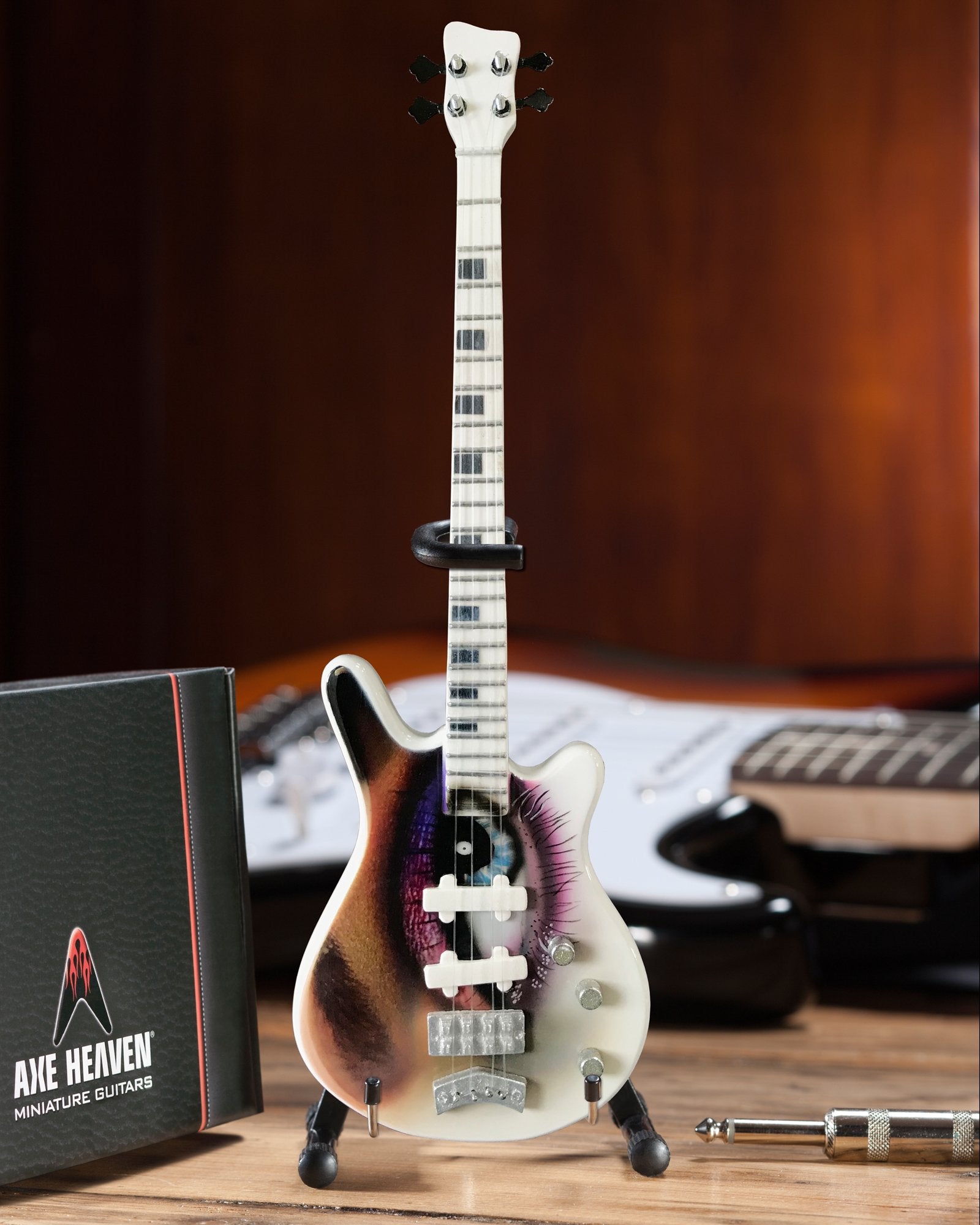 Fan Merch Prince Firma One Eye Bass Guitarra en Miniatura réplica.