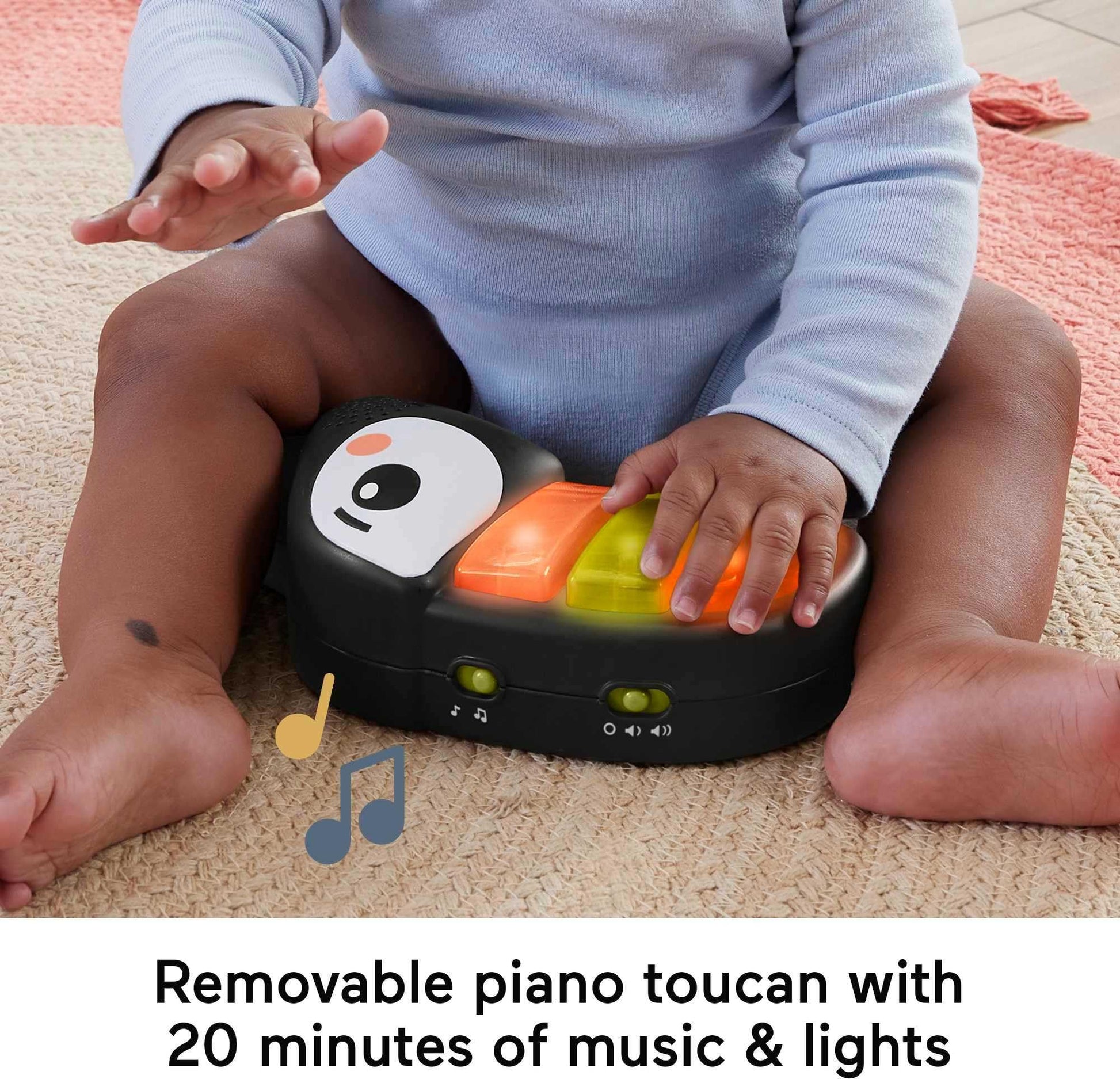 Fisher-Price Baby Bouncer Palm Paradise Jumperoo Centro de actividades con luces musicales sonidos y juguetes de desarrollo