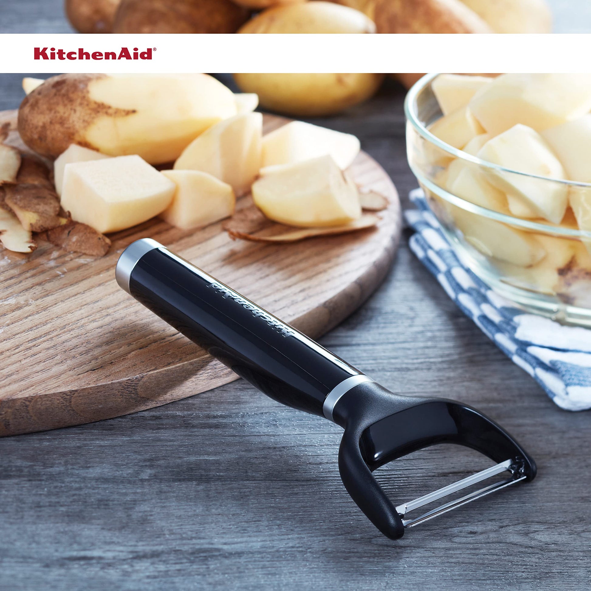 KitchenAid Pelador en Y con mango ergonómico y hoja de un solo filo, apto para lavaplatos con cubierta protectora