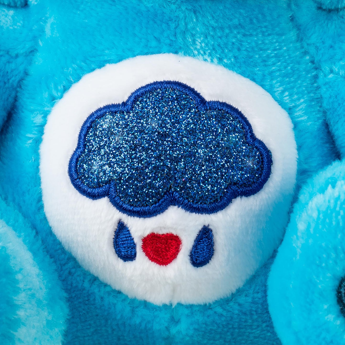 Care Bears Badtz-Maru Muñeco de Peluche Vestido de Oso Gruñón de 23 cm, Azul, Suave y abrazable, Apto para niñas y niños, empleados, coleccionistas, a Partir de los 4 años de Edad