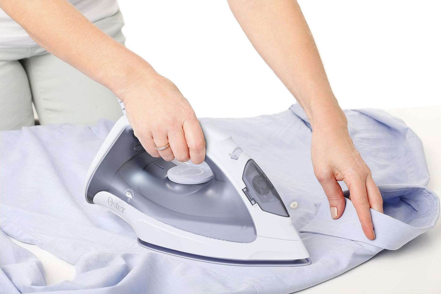 Plancha de Vapor Oster Blanca Lila Ligera