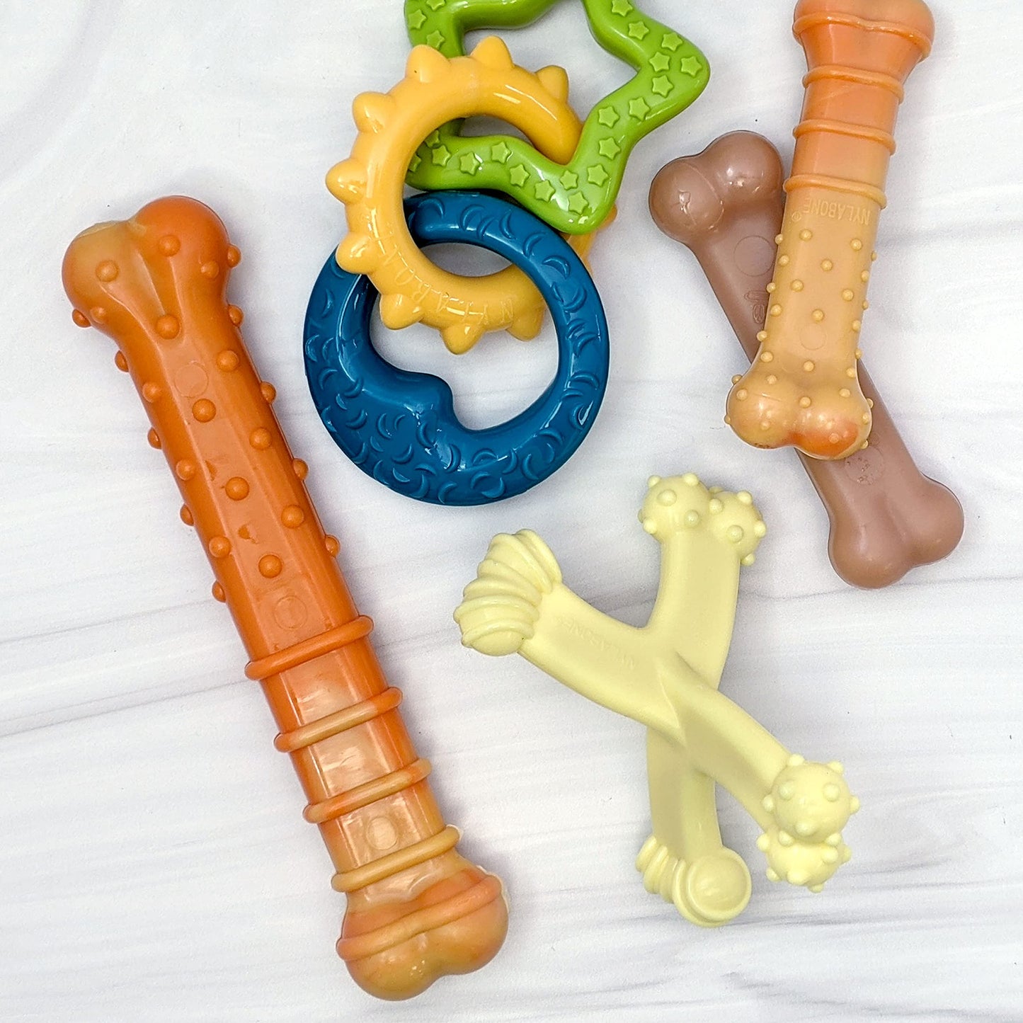 Juguete Masticable de Nailon Nylabone Puppy Power Axis Pequeño para Cachorros
