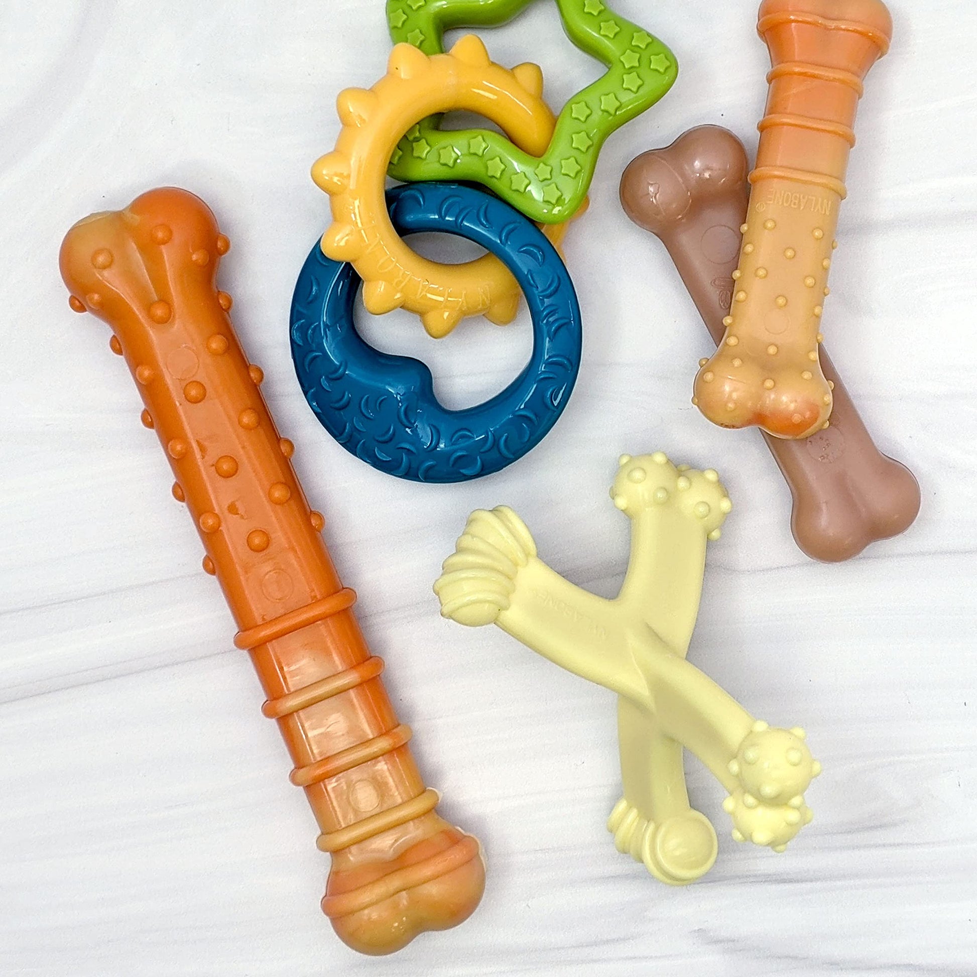 Juguete Masticable de Nailon Nylabone Puppy Power Axis Pequeño para Cachorros