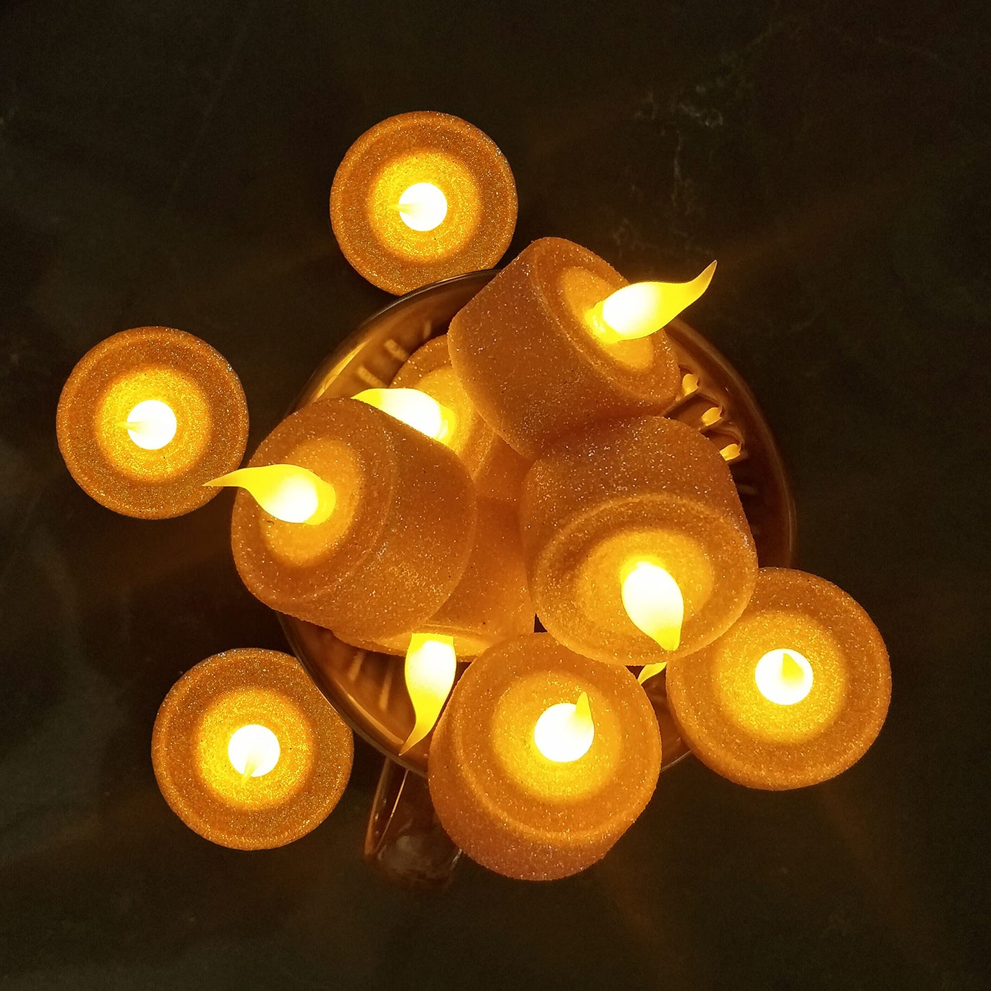 FURORA LIGHTING - Velas LED con purpurina naranja, paquete de 12, velas parpadeantes sin llama para decoración del hogar, 1.5 pulgadas de ancho x 1.65 pulgadas de alto, funciona con pilas