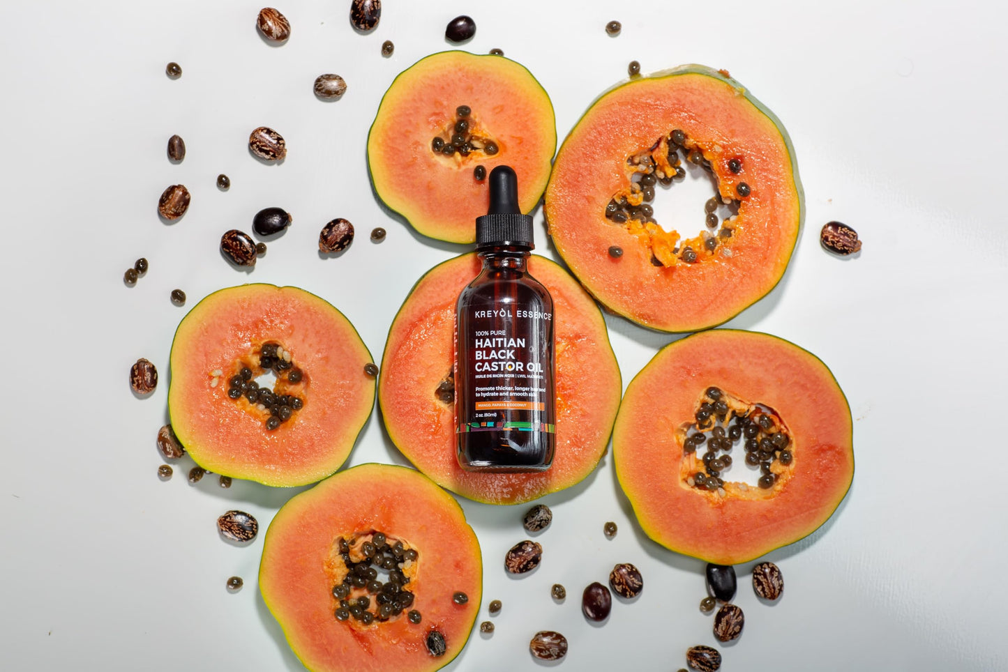 Kreyol Essence - Mango Papaya and Coconut Haitian Black Castor Oil for Skin and Hair, 2 Oz - Omega Fatty Acids (3,6,9) and, Skin, Hair and Body, Hair Growth, Thicker Brows.