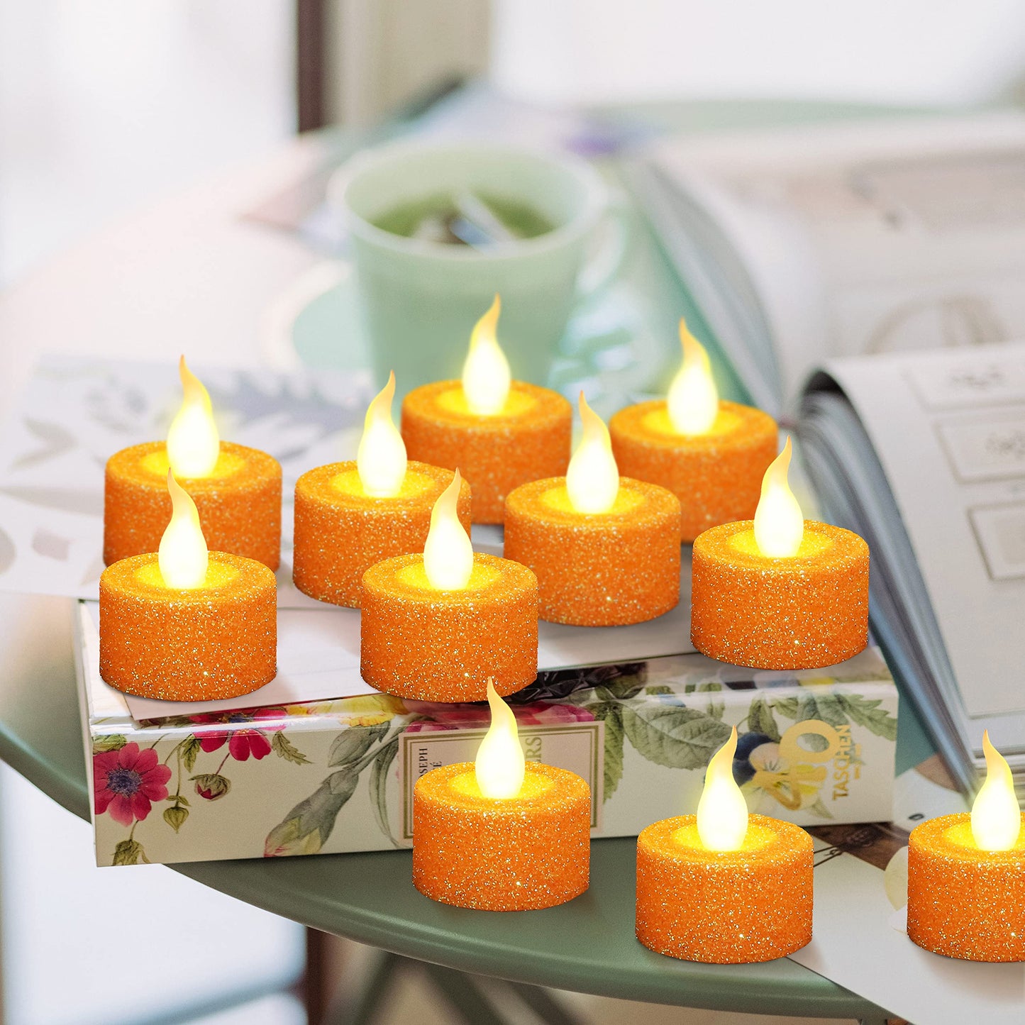 FURORA LIGHTING - Velas LED con purpurina naranja, paquete de 12, velas parpadeantes sin llama para decoración del hogar, 1.5 pulgadas de ancho x 1.65 pulgadas de alto, funciona con pilas