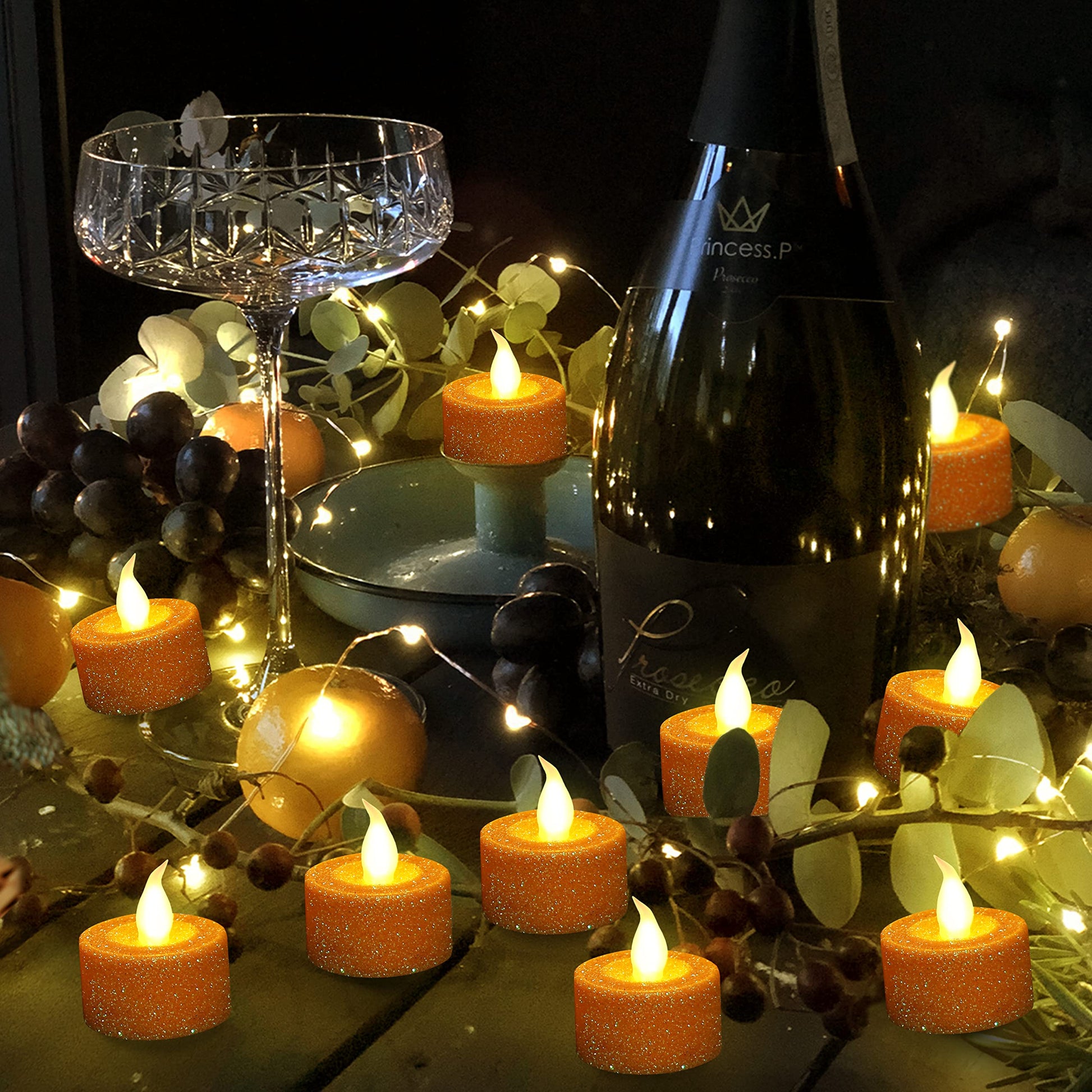 FURORA LIGHTING - Velas LED con purpurina naranja, paquete de 12, velas parpadeantes sin llama para decoración del hogar, 1.5 pulgadas de ancho x 1.65 pulgadas de alto, funciona con pilas