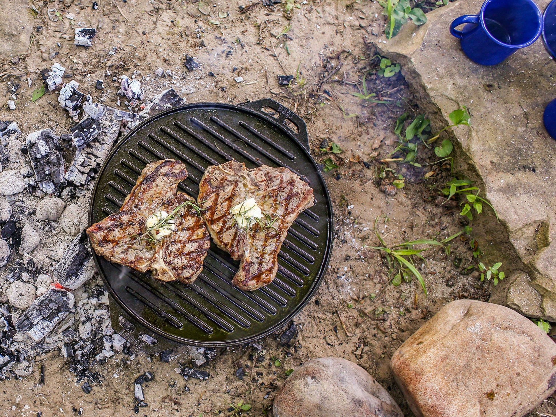 Lodge Cast Iron Cook-It-All Kit. Five-Piece Cast Iron Set Includes a Reversible Grill/Griddle 14 Inch, 6.8 Quart Bottom/Wok, Two Heavy Duty Handles, and a Tips & Tricks Booklet.