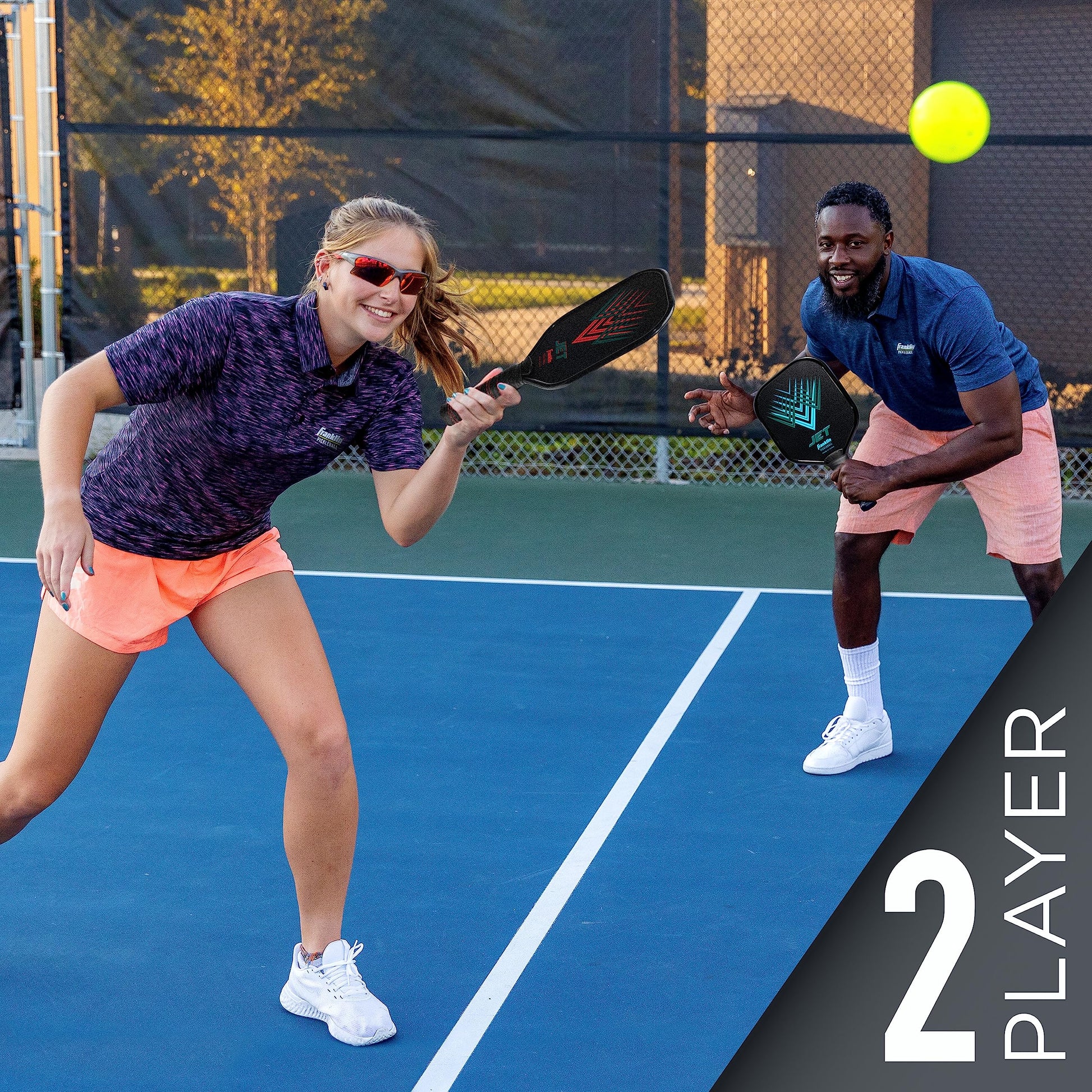 Franklin Sports Juego de Palas de Pickleball + Bolas de Iniciación – 2 Raquetas + 2 Bolas X-40 – Aprobado por Estados Unidos